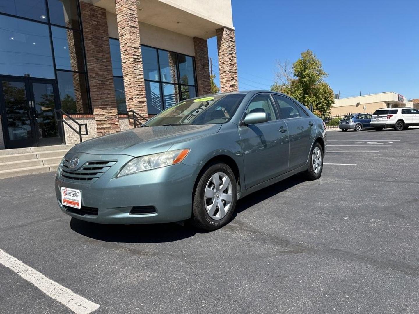 2009 Aloe Green Metallic /Bisque Toyota Camry Base CE (4T1BE46K09U) with an 2.4L I4 SMPI DOHC PZEV engine, Automatic transmission, located at 10890 W. Colfax Ave., Lakewood, CO, 80215, (303) 274-7692, 39.739914, -105.120132 - 2009 Toyota Camry CARFAX One-Owner. FWD <br>All Cars Have Clean Titles And Are Serviced Before Sale., CarfaxOne Owner, No Accidents, Non Smoker, 2.4L I4 SMPI DOHC PZEV, FWD.<br><br>D1 Auto NEVER charges dealer fees! All cars have clean titles and have been inspected for mechanical issues. We have fi - Photo#1