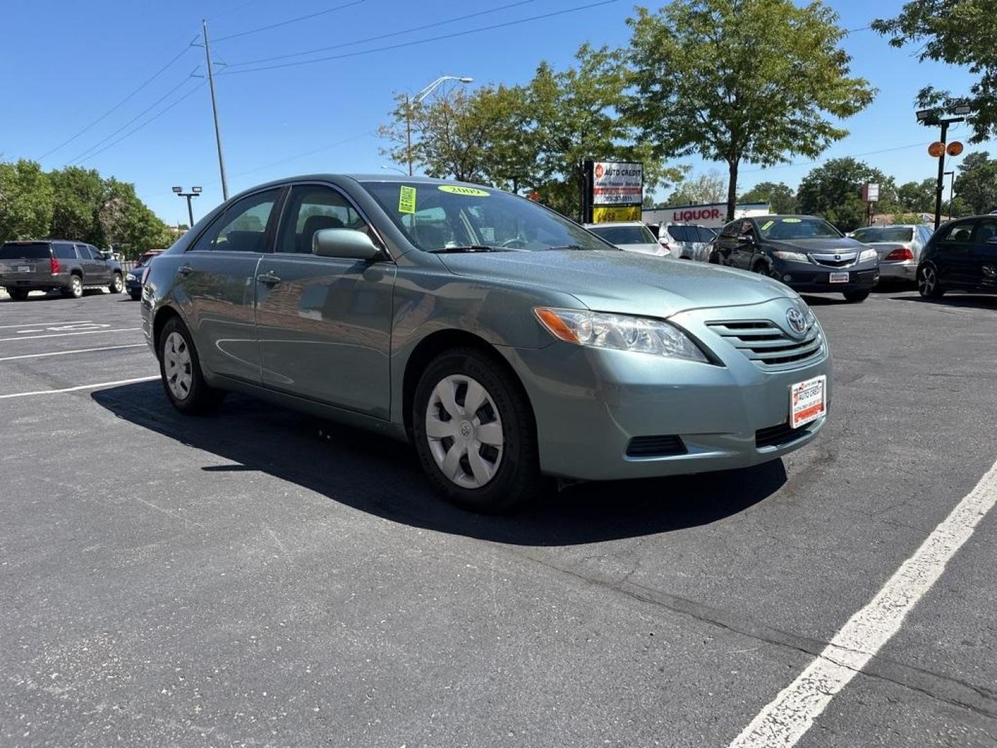 2009 Aloe Green Metallic /Bisque Toyota Camry Base CE (4T1BE46K09U) with an 2.4L I4 SMPI DOHC PZEV engine, Automatic transmission, located at 10890 W. Colfax Ave., Lakewood, CO, 80215, (303) 274-7692, 39.739914, -105.120132 - 2009 Toyota Camry CARFAX One-Owner. FWD <br>All Cars Have Clean Titles And Are Serviced Before Sale., CarfaxOne Owner, No Accidents, Non Smoker, 2.4L I4 SMPI DOHC PZEV, FWD.<br><br>D1 Auto NEVER charges dealer fees! All cars have clean titles and have been inspected for mechanical issues. We have fi - Photo#3