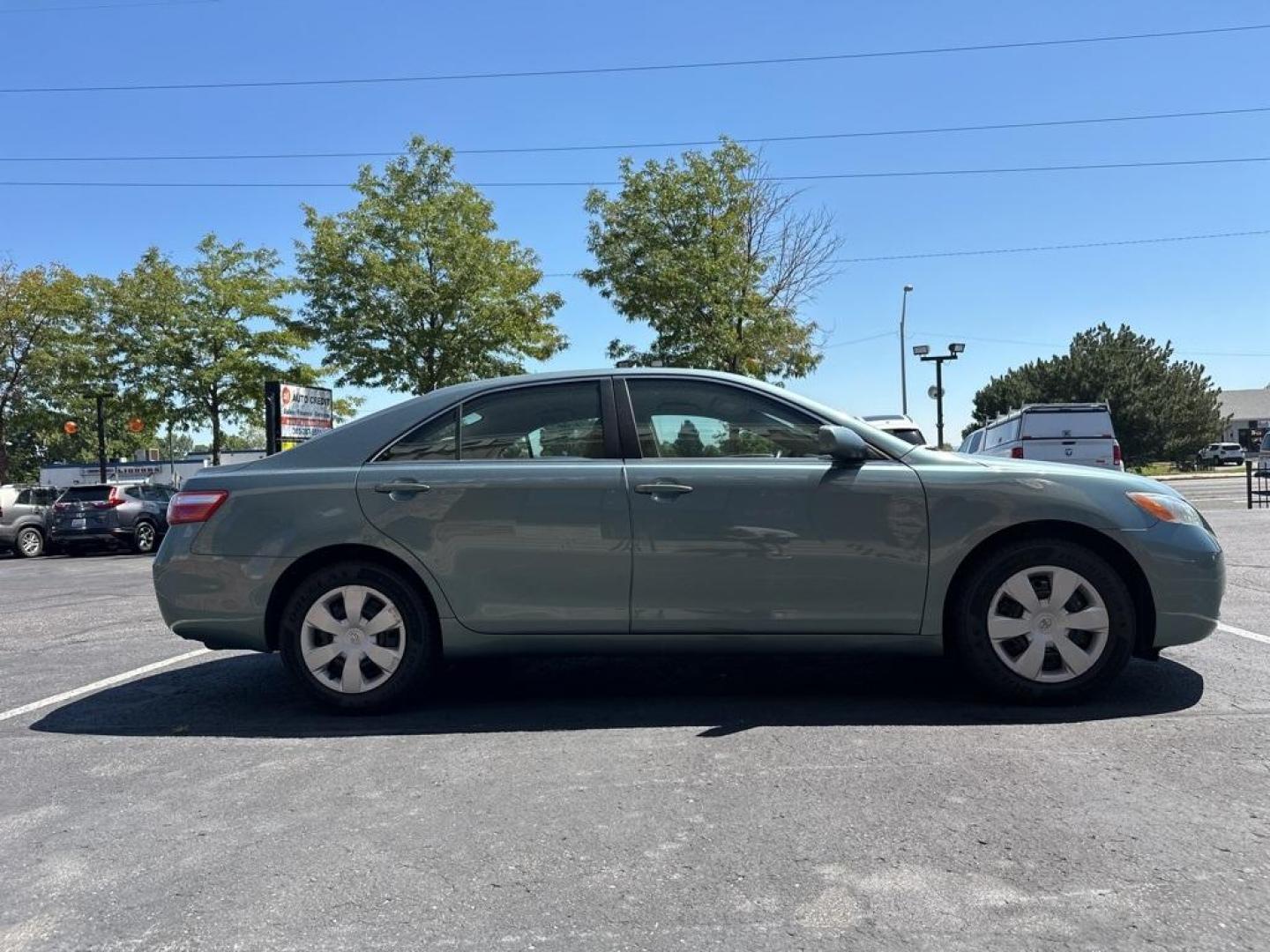 2009 Aloe Green Metallic /Bisque Toyota Camry Base CE (4T1BE46K09U) with an 2.4L I4 SMPI DOHC PZEV engine, Automatic transmission, located at 10890 W. Colfax Ave., Lakewood, CO, 80215, (303) 274-7692, 39.739914, -105.120132 - 2009 Toyota Camry CARFAX One-Owner. FWD <br>All Cars Have Clean Titles And Are Serviced Before Sale., CarfaxOne Owner, No Accidents, Non Smoker, 2.4L I4 SMPI DOHC PZEV, FWD.<br><br>D1 Auto NEVER charges dealer fees! All cars have clean titles and have been inspected for mechanical issues. We have fi - Photo#4