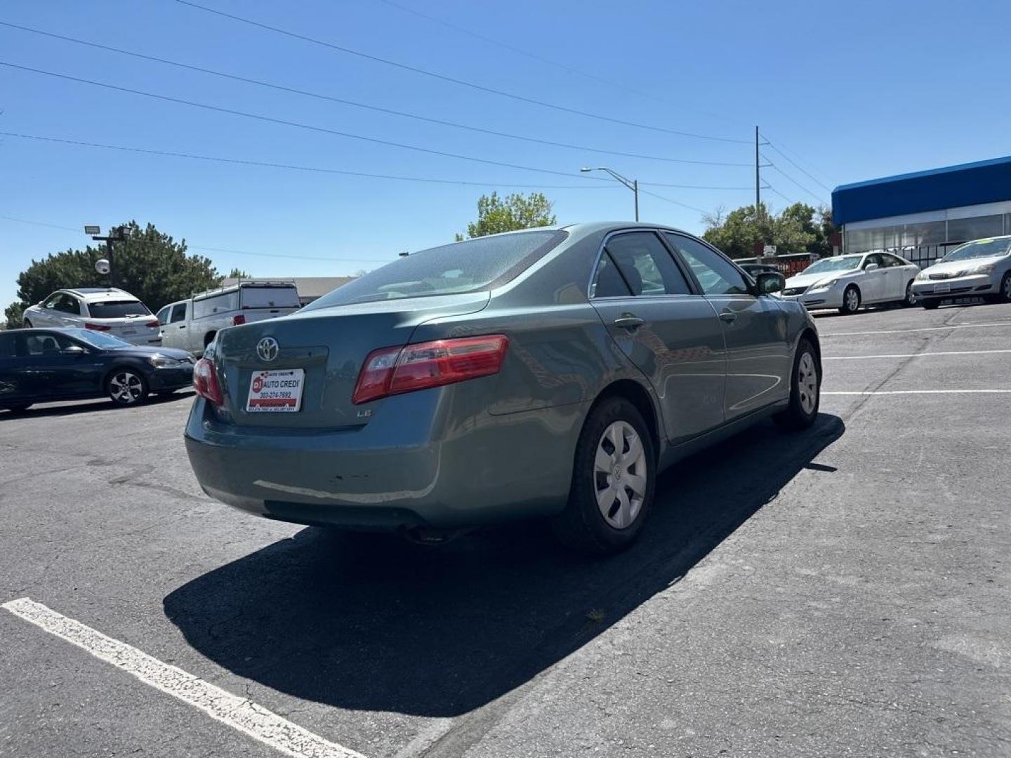 2009 Aloe Green Metallic /Bisque Toyota Camry Base CE (4T1BE46K09U) with an 2.4L I4 SMPI DOHC PZEV engine, Automatic transmission, located at 10890 W. Colfax Ave., Lakewood, CO, 80215, (303) 274-7692, 39.739914, -105.120132 - 2009 Toyota Camry CARFAX One-Owner. FWD <br>All Cars Have Clean Titles And Are Serviced Before Sale., CarfaxOne Owner, No Accidents, Non Smoker, 2.4L I4 SMPI DOHC PZEV, FWD.<br><br>D1 Auto NEVER charges dealer fees! All cars have clean titles and have been inspected for mechanical issues. We have fi - Photo#5