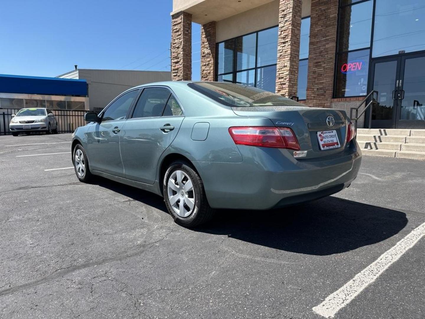 2009 Aloe Green Metallic /Bisque Toyota Camry Base CE (4T1BE46K09U) with an 2.4L I4 SMPI DOHC PZEV engine, Automatic transmission, located at 10890 W. Colfax Ave., Lakewood, CO, 80215, (303) 274-7692, 39.739914, -105.120132 - 2009 Toyota Camry CARFAX One-Owner. FWD <br>All Cars Have Clean Titles And Are Serviced Before Sale., CarfaxOne Owner, No Accidents, Non Smoker, 2.4L I4 SMPI DOHC PZEV, FWD.<br><br>D1 Auto NEVER charges dealer fees! All cars have clean titles and have been inspected for mechanical issues. We have fi - Photo#7