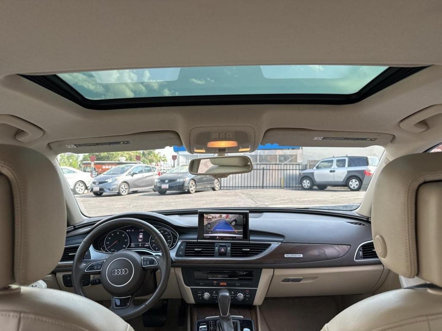 2016 Ibis White /Atlas Beige Audi A6 2.0T Premium Plus (WAUGFAFC4GN) with an 2.0L 4-Cylinder TFSI engine, Automatic transmission, located at 10890 W. Colfax Ave., Lakewood, CO, 80215, (303) 274-7692, 39.739914, -105.120132 - 2016 Audi A6 Premium Plus, Clean Title and fully serviced including new tires, brakes and more. This is a non smoker car and very clean. <br><br>All Cars Have Clean Titles And Are Serviced Before Sale., Clean Carfax, No Accident, Blind Spot Monitoring, Backup Camera, Heated Seats, Bluetooth/ With Bl - Photo#9