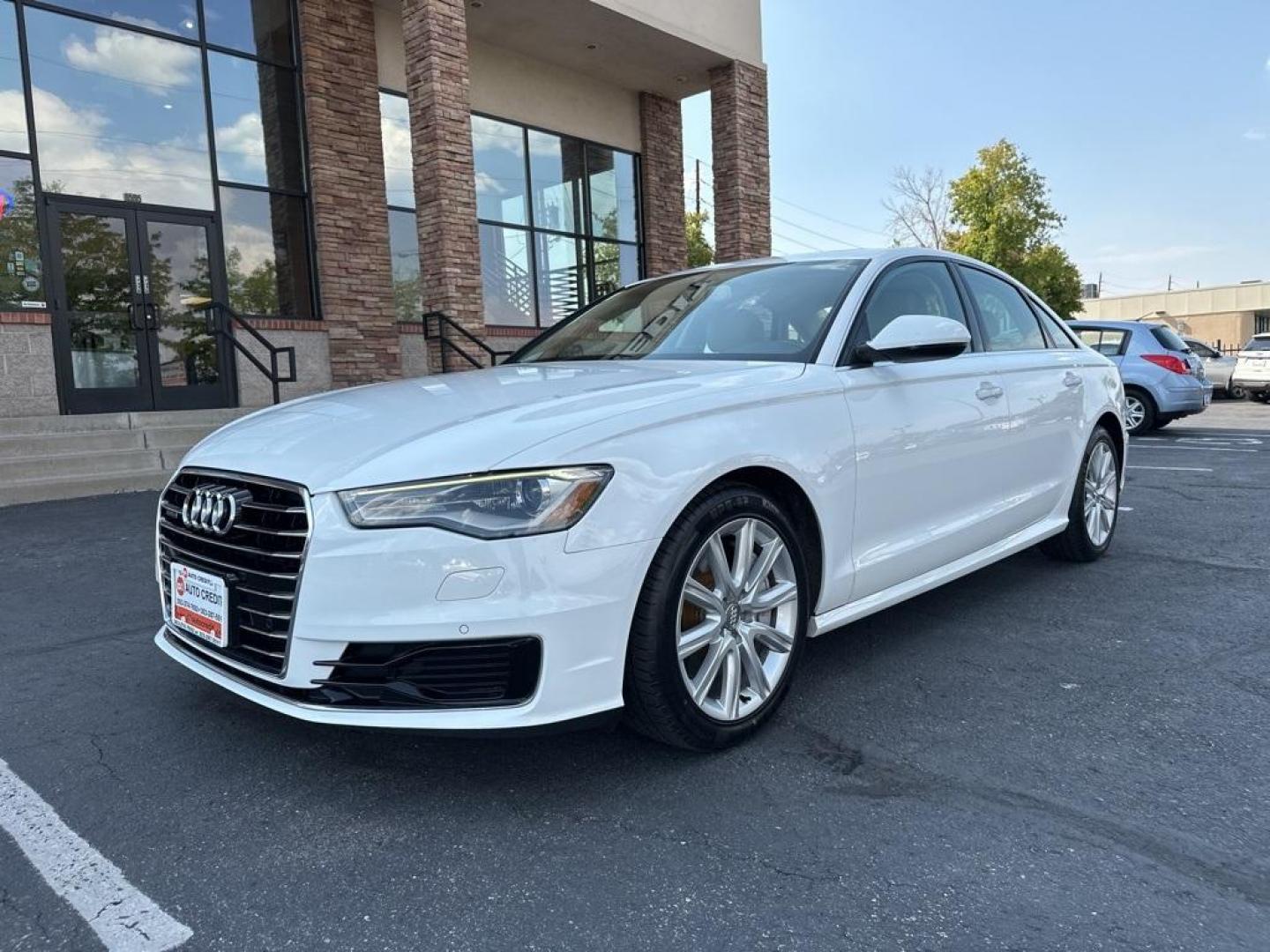 2016 Ibis White /Atlas Beige Audi A6 2.0T Premium Plus (WAUGFAFC4GN) with an 2.0L 4-Cylinder TFSI engine, Automatic transmission, located at 10890 W. Colfax Ave., Lakewood, CO, 80215, (303) 274-7692, 39.739914, -105.120132 - 2016 Audi A6 Premium Plus, Clean Title and fully serviced including new tires, brakes and more. This is a non smoker car and very clean. <br><br>All Cars Have Clean Titles And Are Serviced Before Sale., Clean Carfax, No Accident, Blind Spot Monitoring, Backup Camera, Heated Seats, Bluetooth/ With Bl - Photo#3