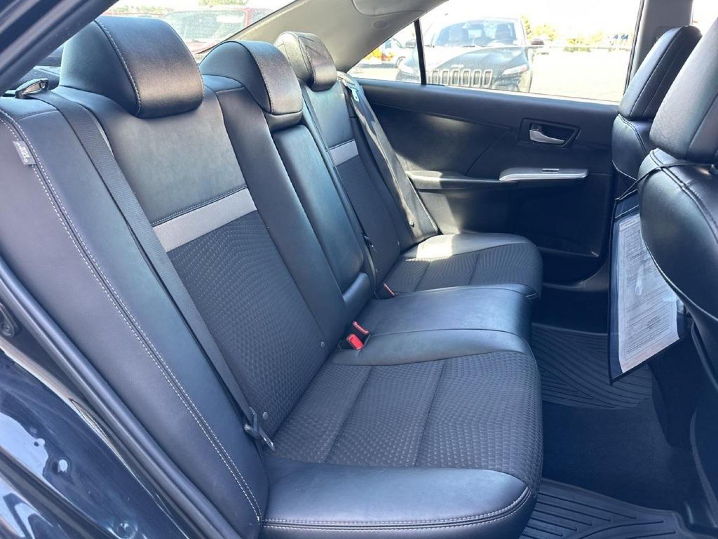 2014 BLACK Toyota Camry SE (4T1BF1FK9EU) with an 4 Cyl, 2.5L engine, Automatic transmission, located at 10890 W. Colfax Ave., Lakewood, CO, 80215, (303) 274-7692, 39.739914, -105.120132 - Introducing the 2014 Toyota Camry SE, a stunning blend of reliability, efficiency, and style that stands out on the road! This vehicle is perfect for those who crave a dynamic driving experience without compromising on comfort and practicality.<br><br>Under the hood, you'll find a spirited 2.5L 4-cy - Photo#36