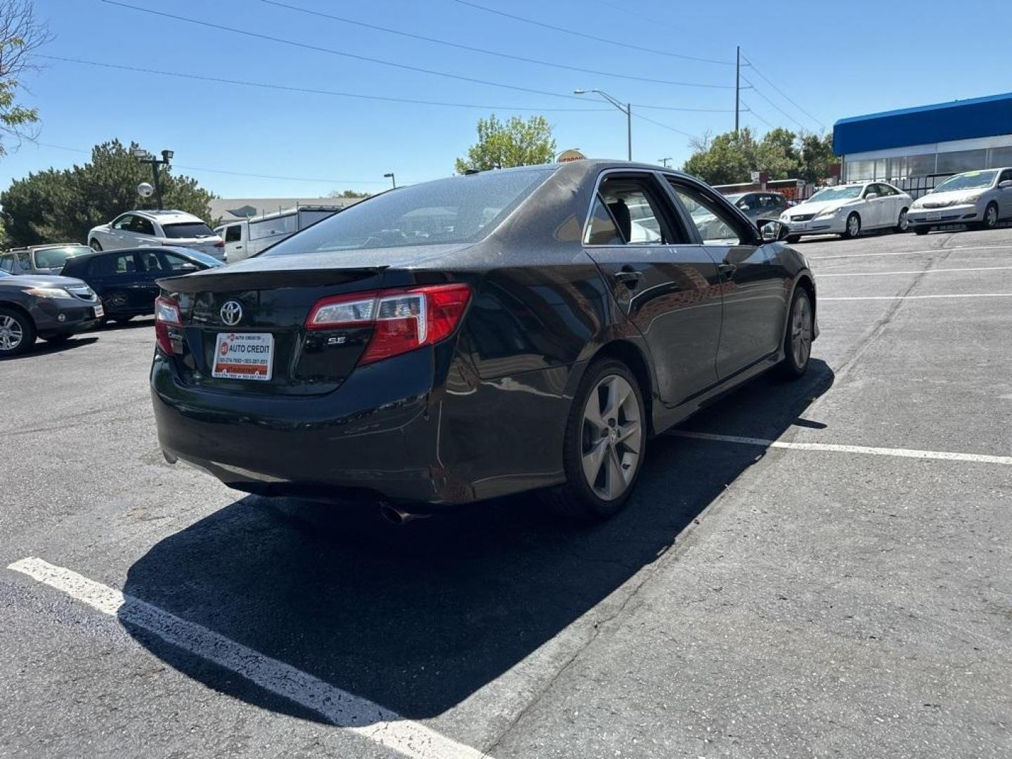 2014 BLACK Toyota Camry SE (4T1BF1FK9EU) with an 4 Cyl, 2.5L engine, Automatic transmission, located at 10890 W. Colfax Ave., Lakewood, CO, 80215, (303) 274-7692, 39.739914, -105.120132 - Introducing the 2014 Toyota Camry SE, a stunning blend of reliability, efficiency, and style that stands out on the road! This vehicle is perfect for those who crave a dynamic driving experience without compromising on comfort and practicality.<br><br>Under the hood, you'll find a spirited 2.5L 4-cy - Photo#27
