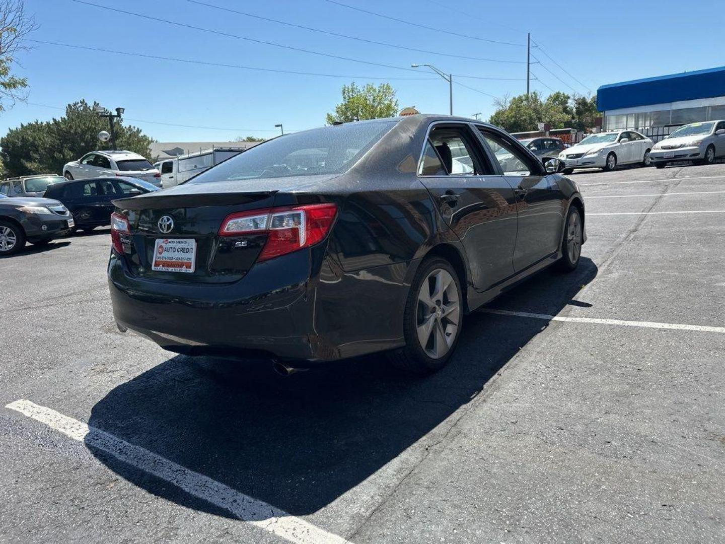 2014 BLACK Toyota Camry SE (4T1BF1FK9EU) with an 4 Cyl, 2.5L engine, Automatic transmission, located at 10890 W. Colfax Ave., Lakewood, CO, 80215, (303) 274-7692, 39.739914, -105.120132 - Introducing the 2014 Toyota Camry SE, a stunning blend of reliability, efficiency, and style that stands out on the road! This vehicle is perfect for those who crave a dynamic driving experience without compromising on comfort and practicality.<br><br>Under the hood, you'll find a spirited 2.5L 4-cy - Photo#5