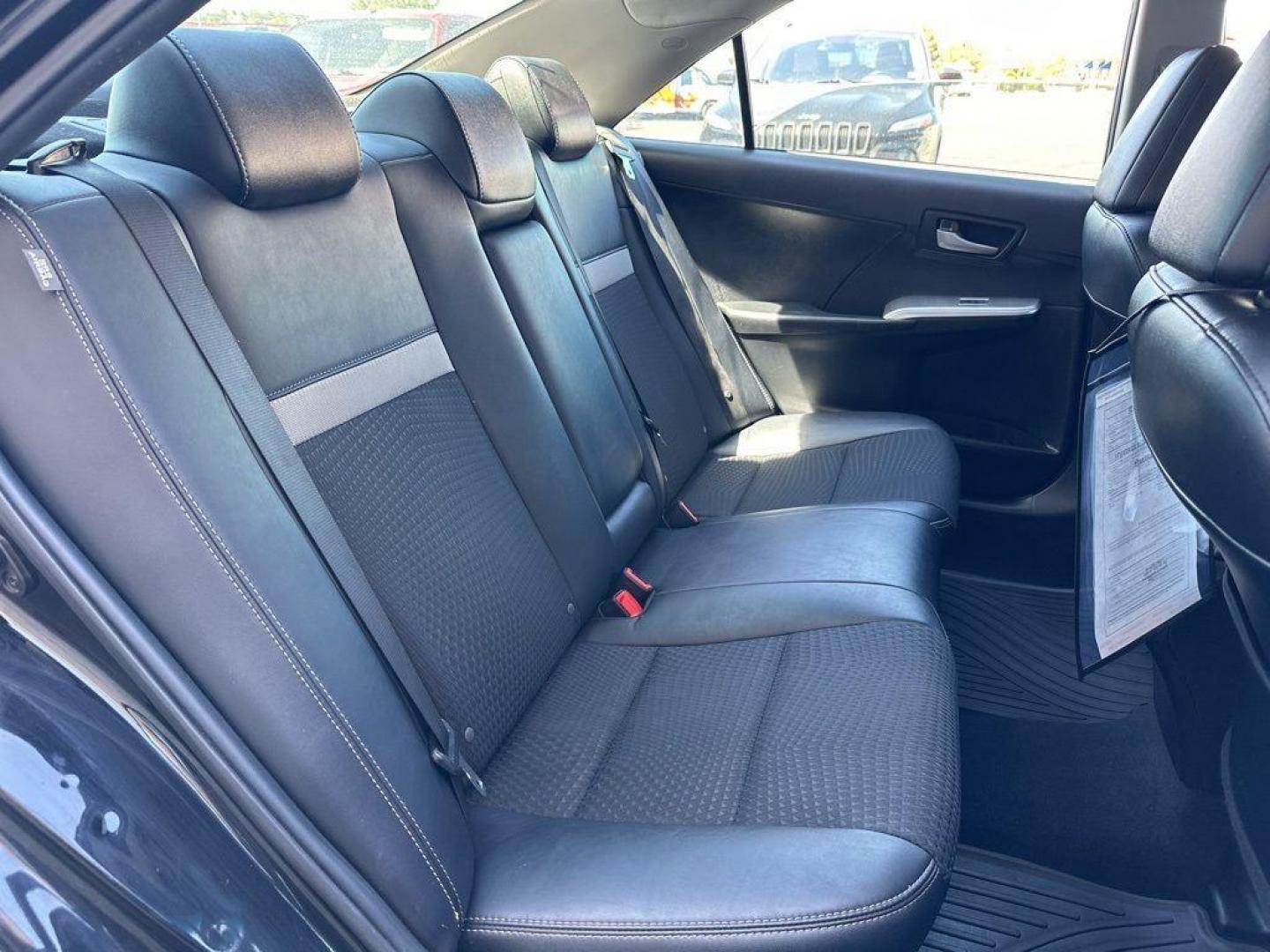 2014 BLACK Toyota Camry SE (4T1BF1FK9EU) with an 4 Cyl, 2.5L engine, Automatic transmission, located at 10890 W. Colfax Ave., Lakewood, CO, 80215, (303) 274-7692, 39.739914, -105.120132 - Introducing the 2014 Toyota Camry SE, a stunning blend of reliability, efficiency, and style that stands out on the road! This vehicle is perfect for those who crave a dynamic driving experience without compromising on comfort and practicality.<br><br>Under the hood, you'll find a spirited 2.5L 4-cy - Photo#14