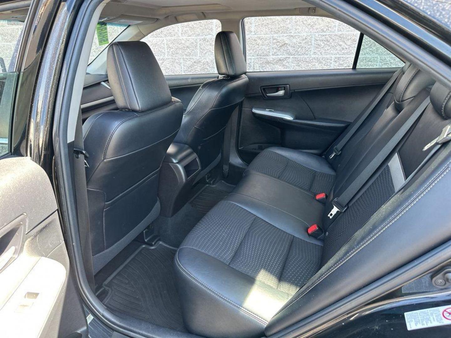 2014 BLACK Toyota Camry SE (4T1BF1FK9EU) with an 4 Cyl, 2.5L engine, Automatic transmission, located at 10890 W. Colfax Ave., Lakewood, CO, 80215, (303) 274-7692, 39.739914, -105.120132 - Introducing the 2014 Toyota Camry SE, a stunning blend of reliability, efficiency, and style that stands out on the road! This vehicle is perfect for those who crave a dynamic driving experience without compromising on comfort and practicality.<br><br>Under the hood, you'll find a spirited 2.5L 4-cy - Photo#16