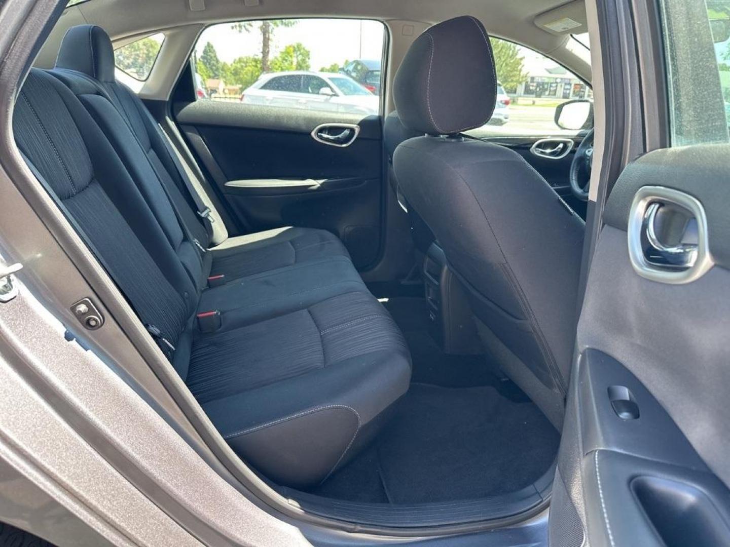 2018 Gun Metallic /Charcoal Nissan Sentra SV (3N1AB7AP6JL) with an 1.8L 4-Cylinder DOHC 16V engine, CVT transmission, located at 10890 W. Colfax Ave., Lakewood, CO, 80215, (303) 274-7692, 39.739914, -105.120132 - 2018 Nissan Sentra<br><br>D1 Auto NEVER charges dealer fees! All cars have clean titles and have been inspected for mechanical issues. We have financing for everyone. Good credit, bad credit, first time buyers.<br><br>Please call Lakewood Location 303-274-7692 or Thornton 303-287-5511 to schedule a - Photo#7