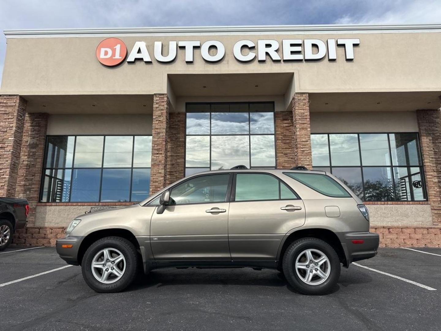2002 Burnished Gold Metallic /Ivory Lexus RX 300 (JTJGF10U820) with an 3.0L V6 SMPI DOHC engine, Automatic transmission, located at 10890 W. Colfax Ave., Lakewood, CO, 80215, (303) 274-7692, 39.739914, -105.120132 - 2002 Lexus RX<br><br>D1 Auto NEVER charges dealer fees! All cars have clean titles and have been inspected for mechanical issues. We have financing for everyone. Good credit, bad credit, first time buyers.<br>Clean CARFAX.<br>Please call Lakewood Location 303-274-7692 or Thornton 303-287-5511 to sch - Photo#0