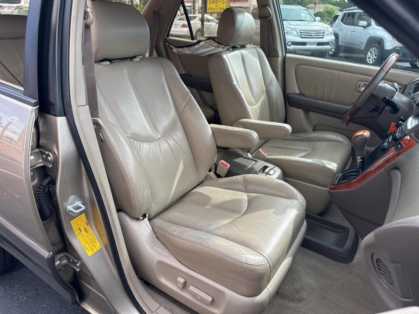 2002 Burnished Gold Metallic /Ivory Lexus RX 300 (JTJGF10U820) with an 3.0L V6 SMPI DOHC engine, Automatic transmission, located at 10890 W. Colfax Ave., Lakewood, CO, 80215, (303) 274-7692, 39.739914, -105.120132 - 2002 Lexus RX<br><br>D1 Auto NEVER charges dealer fees! All cars have clean titles and have been inspected for mechanical issues. We have financing for everyone. Good credit, bad credit, first time buyers.<br>Clean CARFAX.<br>Please call Lakewood Location 303-274-7692 or Thornton 303-287-5511 to sch - Photo#12
