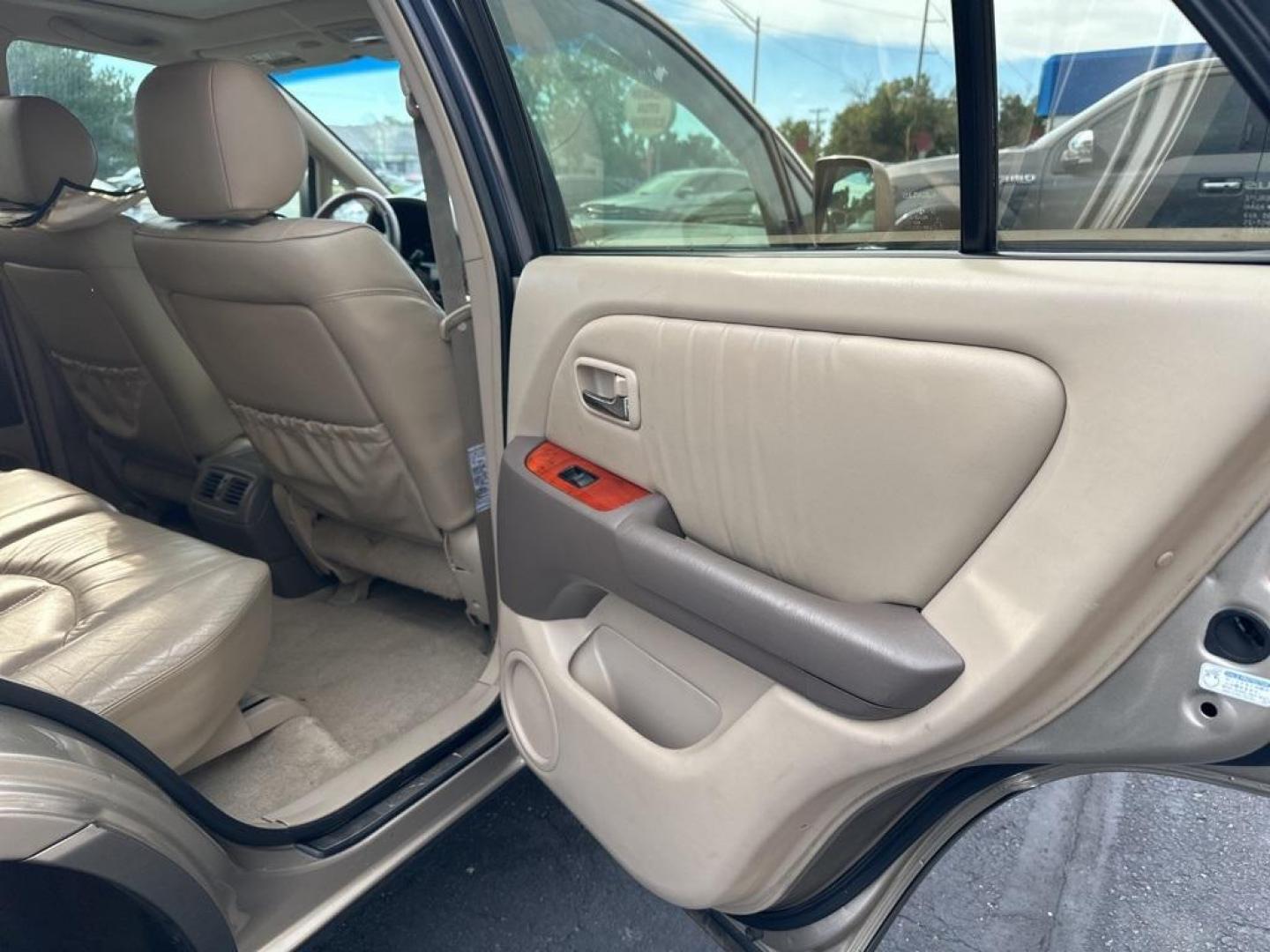 2002 Burnished Gold Metallic /Ivory Lexus RX 300 (JTJGF10U820) with an 3.0L V6 SMPI DOHC engine, Automatic transmission, located at 10890 W. Colfax Ave., Lakewood, CO, 80215, (303) 274-7692, 39.739914, -105.120132 - 2002 Lexus RX<br><br>D1 Auto NEVER charges dealer fees! All cars have clean titles and have been inspected for mechanical issues. We have financing for everyone. Good credit, bad credit, first time buyers.<br>Clean CARFAX.<br>Please call Lakewood Location 303-274-7692 or Thornton 303-287-5511 to sch - Photo#16
