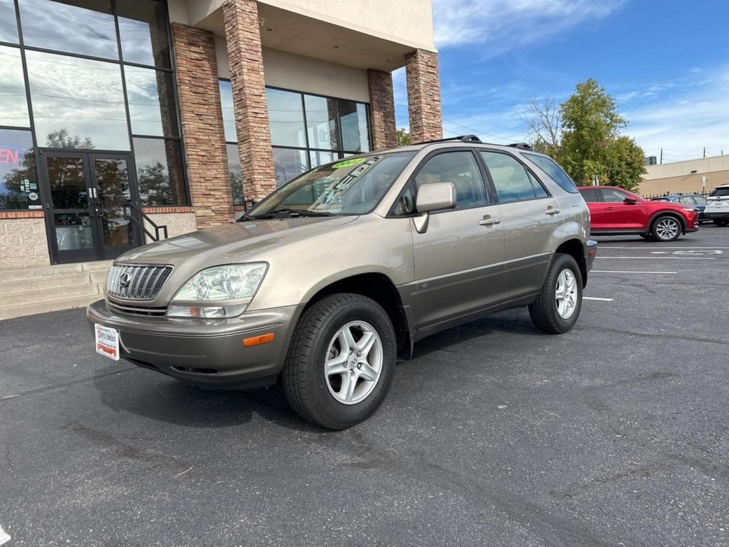 2002 Burnished Gold Metallic /Ivory Lexus RX 300 (JTJGF10U820) with an 3.0L V6 SMPI DOHC engine, Automatic transmission, located at 10890 W. Colfax Ave., Lakewood, CO, 80215, (303) 274-7692, 39.739914, -105.120132 - 2002 Lexus RX<br><br>D1 Auto NEVER charges dealer fees! All cars have clean titles and have been inspected for mechanical issues. We have financing for everyone. Good credit, bad credit, first time buyers.<br>Clean CARFAX.<br>Please call Lakewood Location 303-274-7692 or Thornton 303-287-5511 to sch - Photo#1