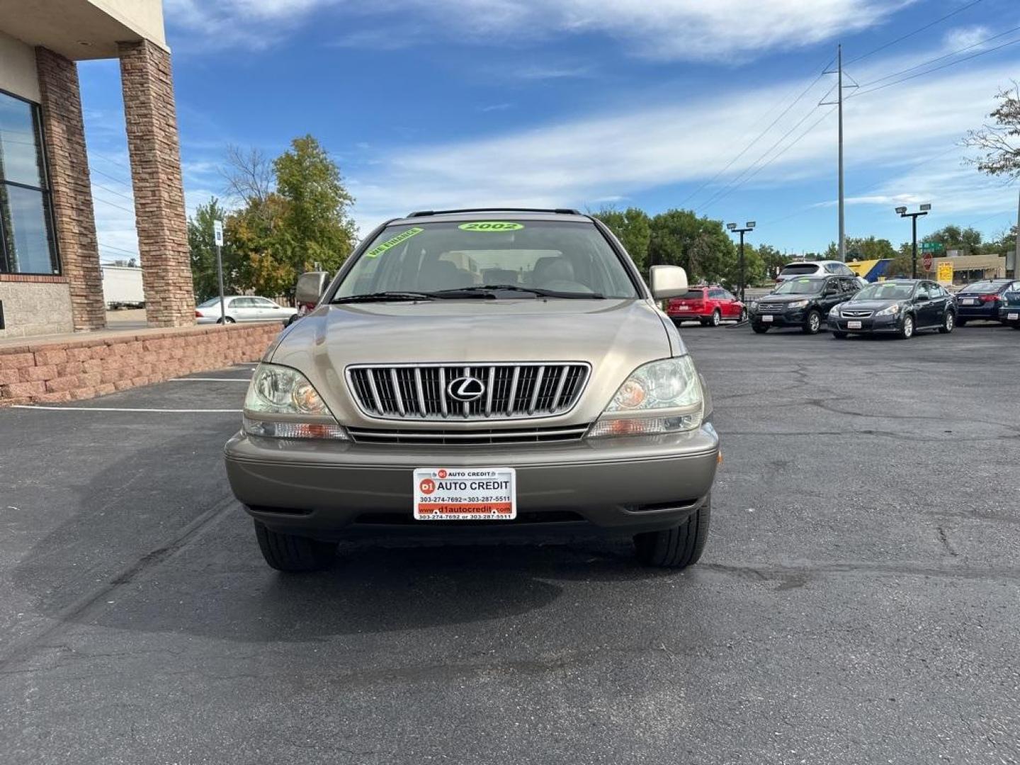 2002 Burnished Gold Metallic /Ivory Lexus RX 300 (JTJGF10U820) with an 3.0L V6 SMPI DOHC engine, Automatic transmission, located at 10890 W. Colfax Ave., Lakewood, CO, 80215, (303) 274-7692, 39.739914, -105.120132 - 2002 Lexus RX<br><br>D1 Auto NEVER charges dealer fees! All cars have clean titles and have been inspected for mechanical issues. We have financing for everyone. Good credit, bad credit, first time buyers.<br>Clean CARFAX.<br>Please call Lakewood Location 303-274-7692 or Thornton 303-287-5511 to sch - Photo#2