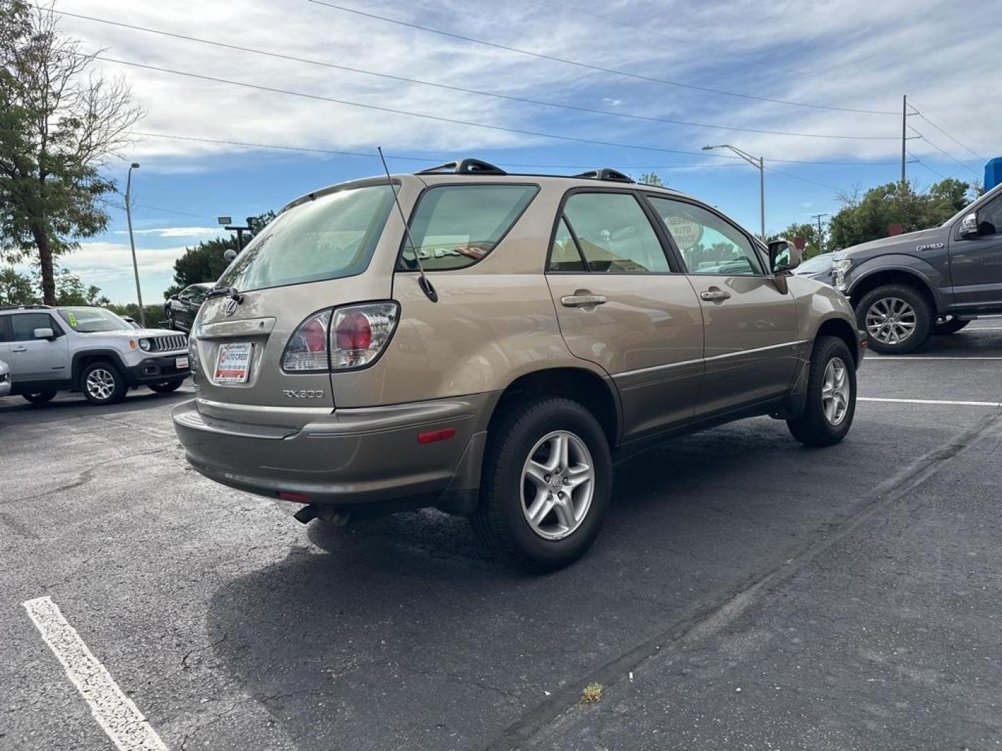 2002 Burnished Gold Metallic /Ivory Lexus RX 300 (JTJGF10U820) with an 3.0L V6 SMPI DOHC engine, Automatic transmission, located at 10890 W. Colfax Ave., Lakewood, CO, 80215, (303) 274-7692, 39.739914, -105.120132 - 2002 Lexus RX<br><br>D1 Auto NEVER charges dealer fees! All cars have clean titles and have been inspected for mechanical issues. We have financing for everyone. Good credit, bad credit, first time buyers.<br>Clean CARFAX.<br>Please call Lakewood Location 303-274-7692 or Thornton 303-287-5511 to sch - Photo#5