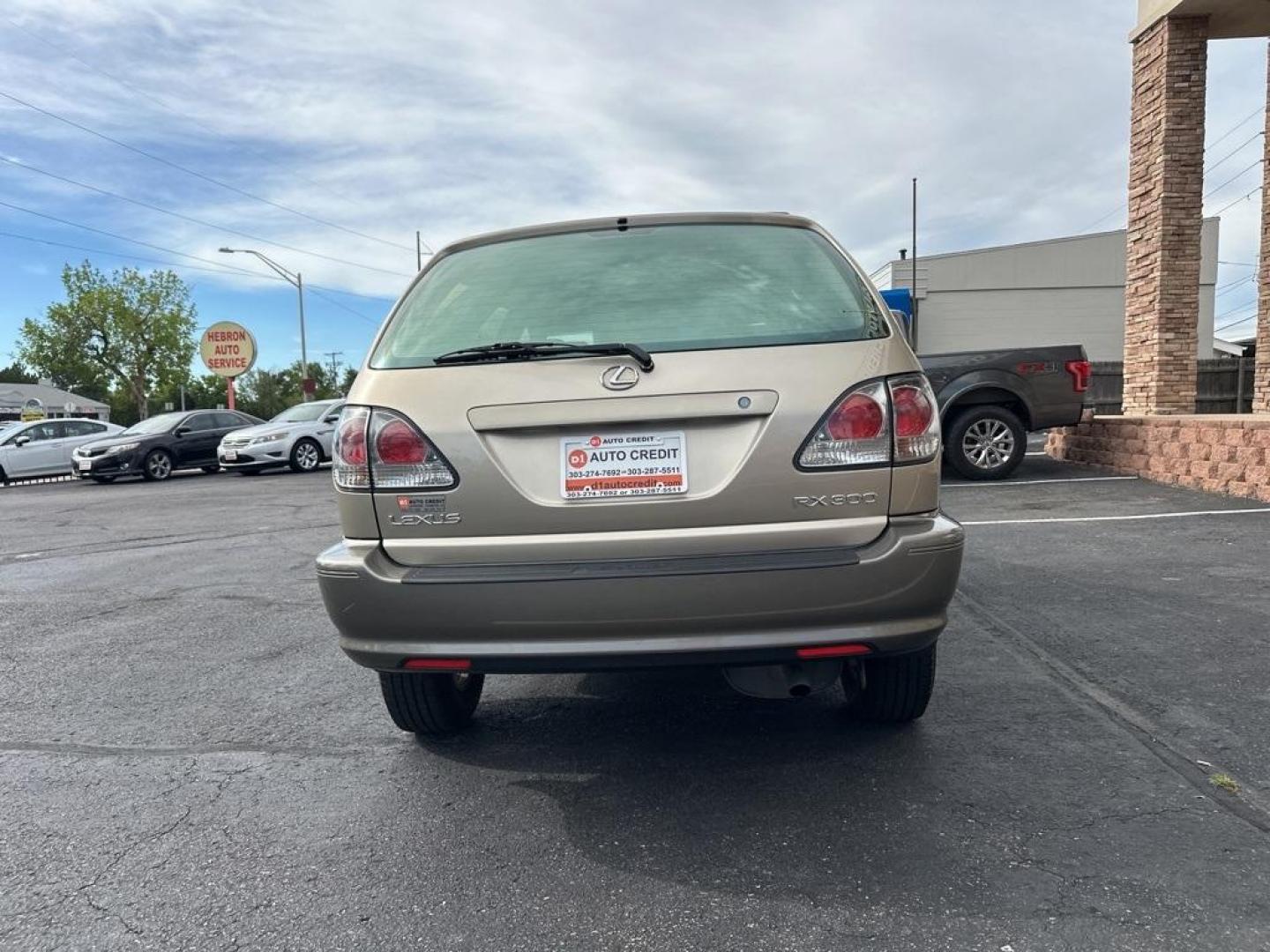 2002 Burnished Gold Metallic /Ivory Lexus RX 300 (JTJGF10U820) with an 3.0L V6 SMPI DOHC engine, Automatic transmission, located at 10890 W. Colfax Ave., Lakewood, CO, 80215, (303) 274-7692, 39.739914, -105.120132 - 2002 Lexus RX<br><br>D1 Auto NEVER charges dealer fees! All cars have clean titles and have been inspected for mechanical issues. We have financing for everyone. Good credit, bad credit, first time buyers.<br>Clean CARFAX.<br>Please call Lakewood Location 303-274-7692 or Thornton 303-287-5511 to sch - Photo#6