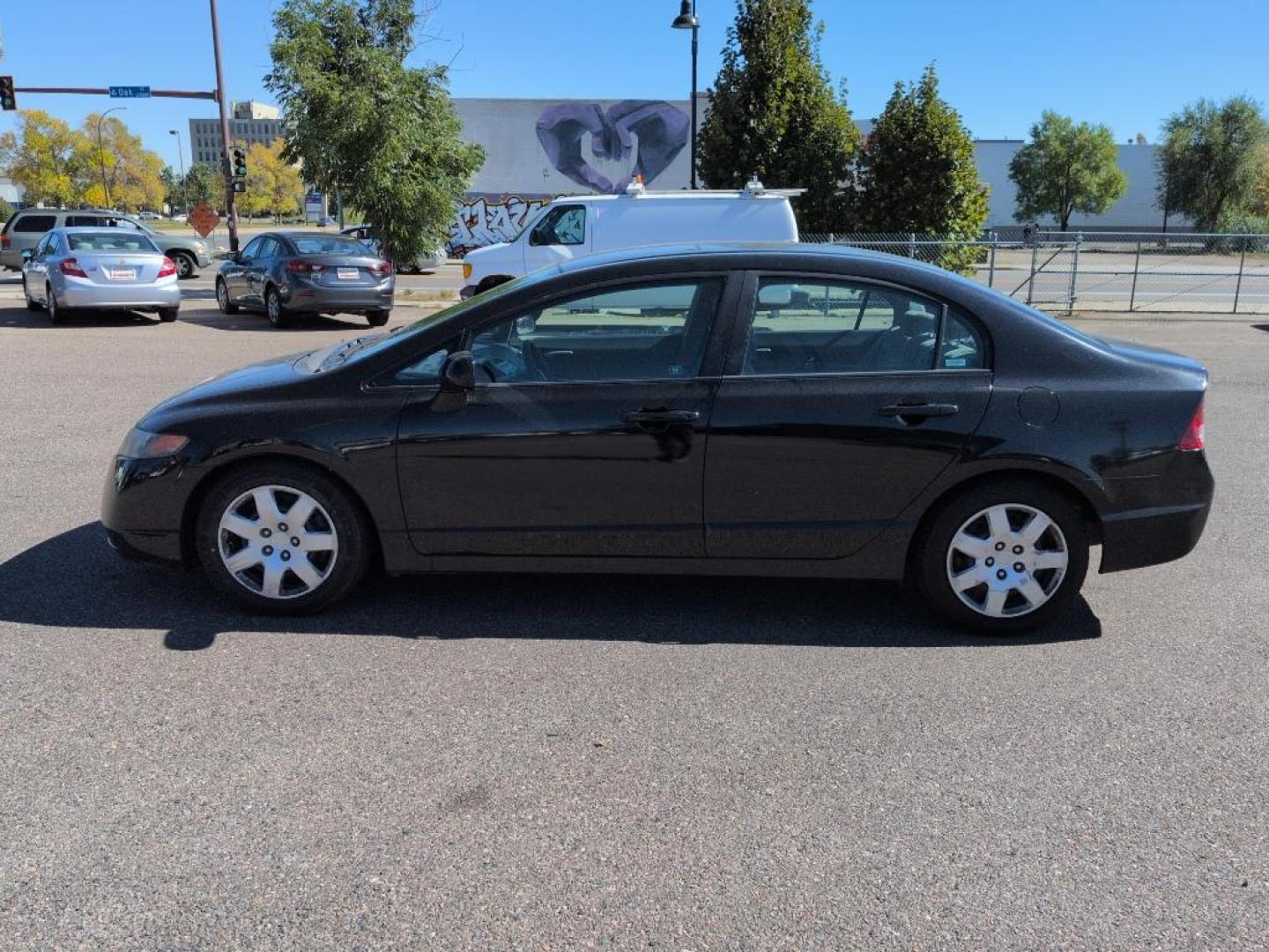 2008 BLACK Honda Civic LX (1HGFA165X8L) with an 4 Cyl, 1.8L engine, Automatic transmission, located at 10890 W. Colfax Ave., Lakewood, CO, 80215, (303) 274-7692, 39.739914, -105.120132 - Photo#7