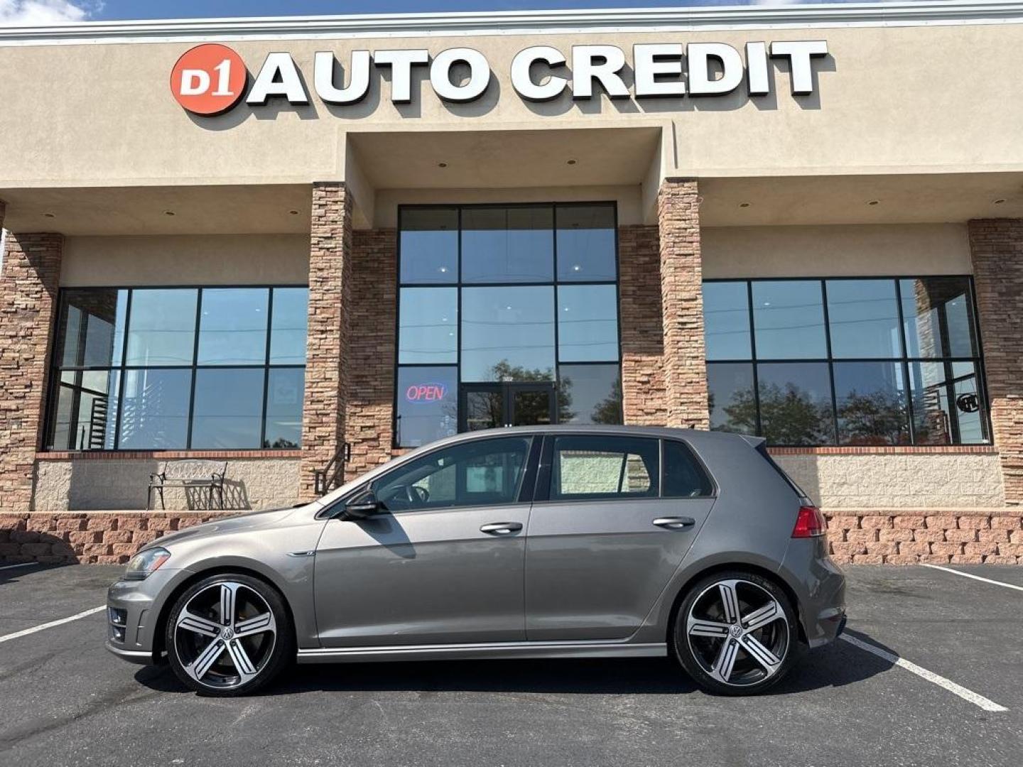 2016 Limestone Gray Metallic /Black Volkswagen Golf R Base (WVWUF7AUXGW) with an 2.0L TSI engine, Manual transmission, located at 10890 W. Colfax Ave., Lakewood, CO, 80215, (303) 274-7692, 39.739914, -105.120132 - 2016 Volkswagen Golf R, One Owner with a clean title and clean Carfax. Fully serviced and ready for Colorado. Heated leather seats, Fender Speakers and All Wheel Drive. <br><br>All Cars Have Clean Titles And Are Serviced Before Sale., Clean Carfax, No Accident, Backup Camera, Leather, Heated Seats, - Photo#0