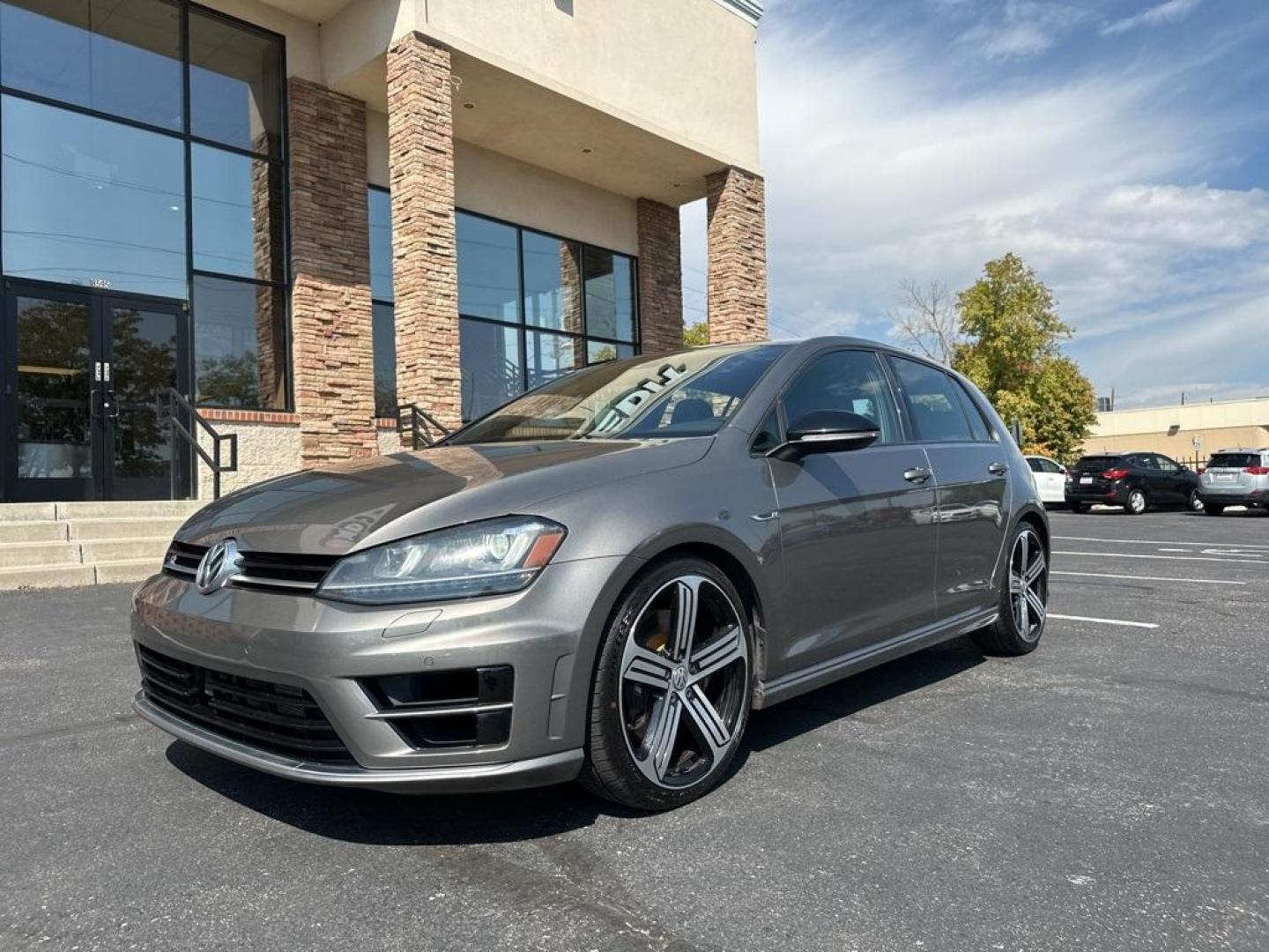 2016 Limestone Gray Metallic /Black Volkswagen Golf R Base (WVWUF7AUXGW) with an 2.0L TSI engine, Manual transmission, located at 10890 W. Colfax Ave., Lakewood, CO, 80215, (303) 274-7692, 39.739914, -105.120132 - 2016 Volkswagen Golf R, One Owner with a clean title and clean Carfax. Fully serviced and ready for Colorado. Heated leather seats, Fender Speakers and All Wheel Drive. <br><br>All Cars Have Clean Titles And Are Serviced Before Sale., Clean Carfax, No Accident, Backup Camera, Leather, Heated Seats, - Photo#1
