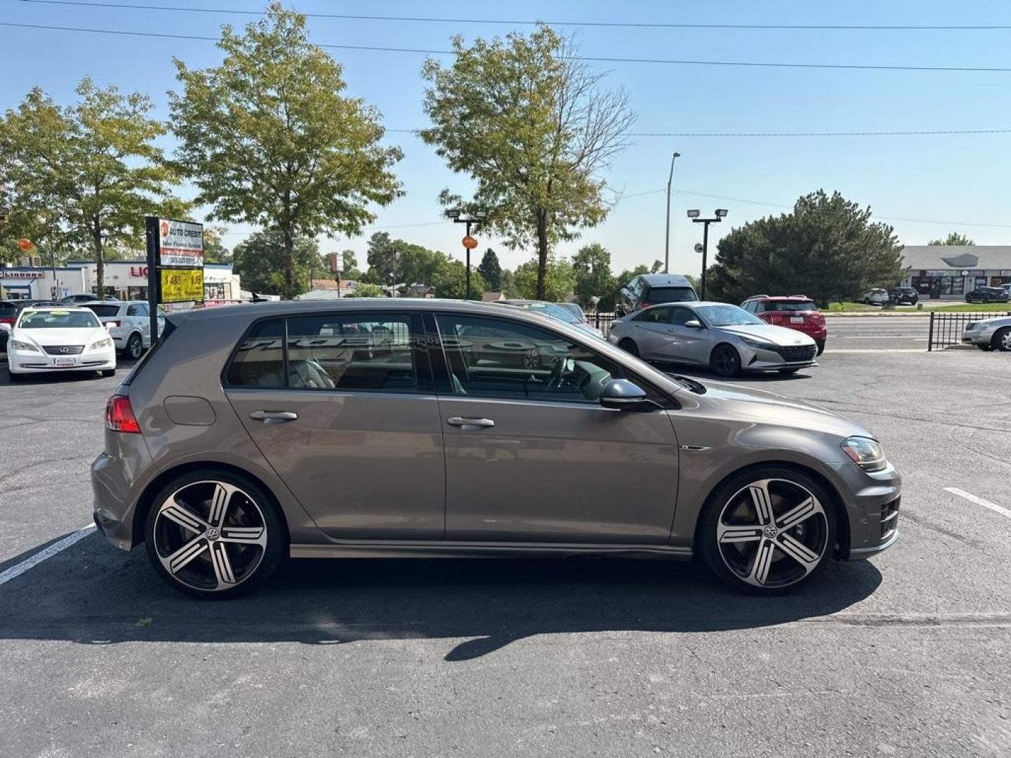 2016 Limestone Gray Metallic /Black Volkswagen Golf R Base (WVWUF7AUXGW) with an 2.0L TSI engine, Manual transmission, located at 10890 W. Colfax Ave., Lakewood, CO, 80215, (303) 274-7692, 39.739914, -105.120132 - 2016 Volkswagen Golf R, One Owner with a clean title and clean Carfax. Fully serviced and ready for Colorado. Heated leather seats, Fender Speakers and All Wheel Drive. <br><br>All Cars Have Clean Titles And Are Serviced Before Sale., Clean Carfax, No Accident, Backup Camera, Leather, Heated Seats, - Photo#4