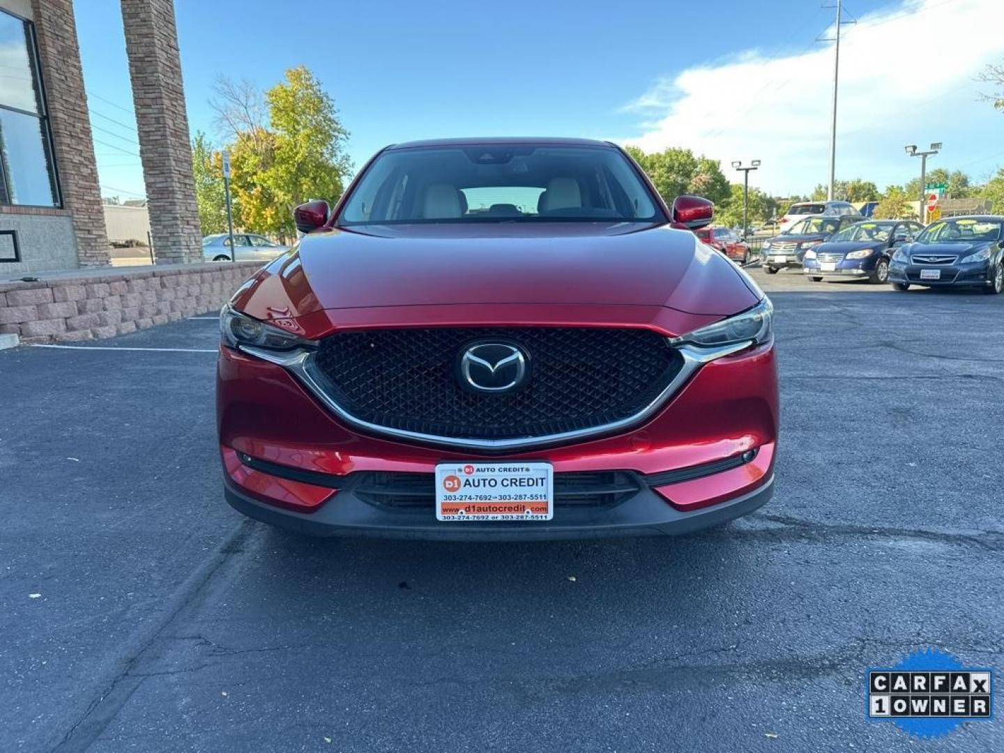2019 Soul Red Crystal Metallic /Parchment Mazda CX-5 Grand Touring Reserve (JM3KFBDYXK0) with an 2.5L 4-Cylinder engine, Automatic transmission, located at 10890 W. Colfax Ave., Lakewood, CO, 80215, (303) 274-7692, 39.739914, -105.120132 - 2019 Mazda CX-5 Grand Touring Reserve in mint condition! Loaded with heated leather seats, heated steering wheel, heads up display, Apple/Android Carplay, panoramic roof, Bose speakers and more. <br><br>All Cars Have Clean Titles And Are Serviced Before Sale.<br>Apple/Android Car Play, All Books and - Photo#2