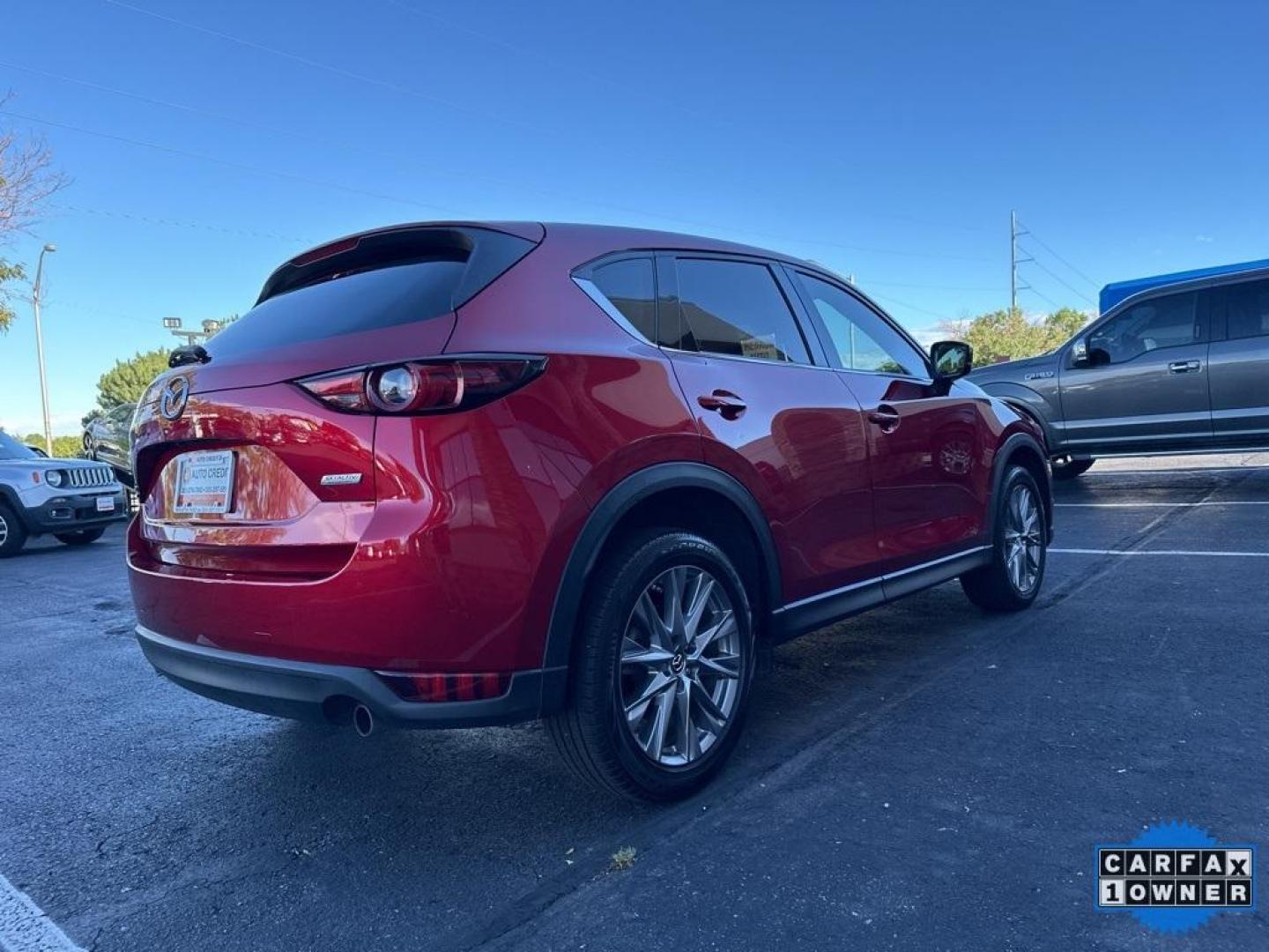 2019 Soul Red Crystal Metallic /Parchment Mazda CX-5 Grand Touring Reserve (JM3KFBDYXK0) with an 2.5L 4-Cylinder engine, Automatic transmission, located at 10890 W. Colfax Ave., Lakewood, CO, 80215, (303) 274-7692, 39.739914, -105.120132 - 2019 Mazda CX-5 Grand Touring Reserve in mint condition! Loaded with heated leather seats, heated steering wheel, heads up display, Apple/Android Carplay, panoramic roof, Bose speakers and more. <br><br>All Cars Have Clean Titles And Are Serviced Before Sale.<br>Apple/Android Car Play, All Books and - Photo#5