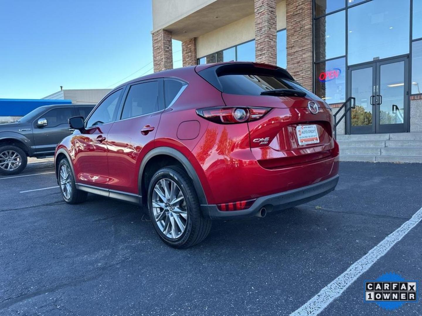2019 Soul Red Crystal Metallic /Parchment Mazda CX-5 Grand Touring Reserve (JM3KFBDYXK0) with an 2.5L 4-Cylinder engine, Automatic transmission, located at 10890 W. Colfax Ave., Lakewood, CO, 80215, (303) 274-7692, 39.739914, -105.120132 - 2019 Mazda CX-5 Grand Touring Reserve in mint condition! Loaded with heated leather seats, heated steering wheel, heads up display, Apple/Android Carplay, panoramic roof, Bose speakers and more. <br><br>All Cars Have Clean Titles And Are Serviced Before Sale.<br>Apple/Android Car Play, All Books and - Photo#7