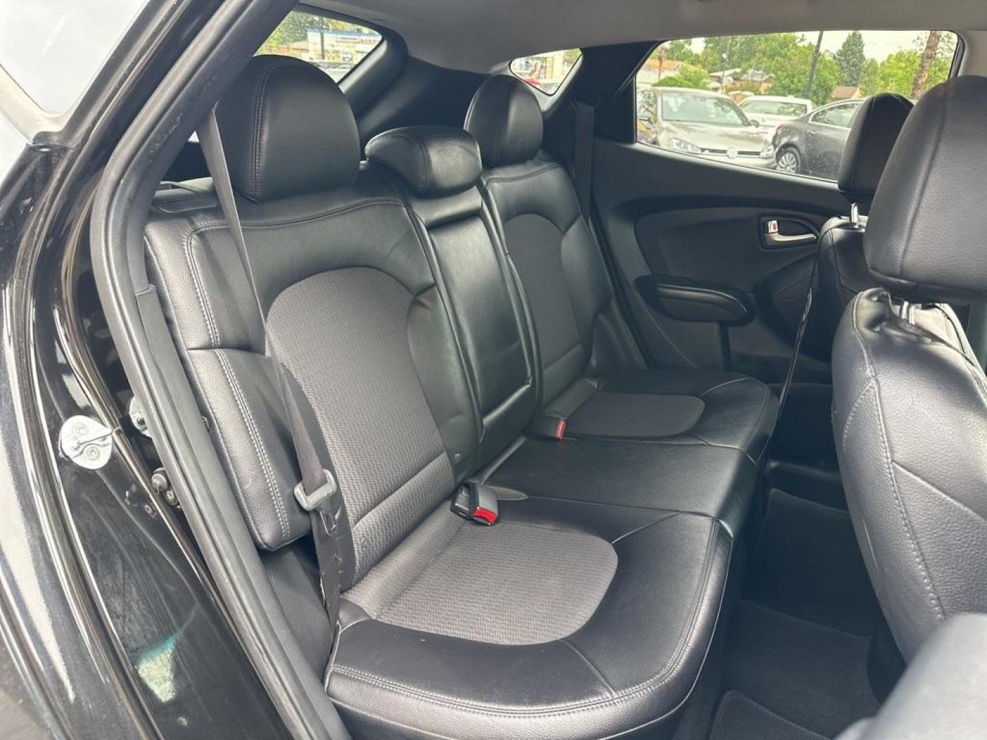 2013 Ash Black /Black Hyundai Tucson GLS (KM8JUCAC6DU) with an 2.4L I4 MPI DOHC CVVT 16V Theta 2 engine, Automatic transmission, located at 10890 W. Colfax Ave., Lakewood, CO, 80215, (303) 274-7692, 39.739914, -105.120132 - 2013 Hyundai Tucson<br><br>D1 Auto NEVER charges dealer fees! All cars have clean titles and have been inspected for mechanical issues. We have financing for everyone. Good credit, bad credit, first time buyers.<br><br>Please call Lakewood Location 303-274-7692 or Thornton 303-287-5511 to schedule a - Photo#10