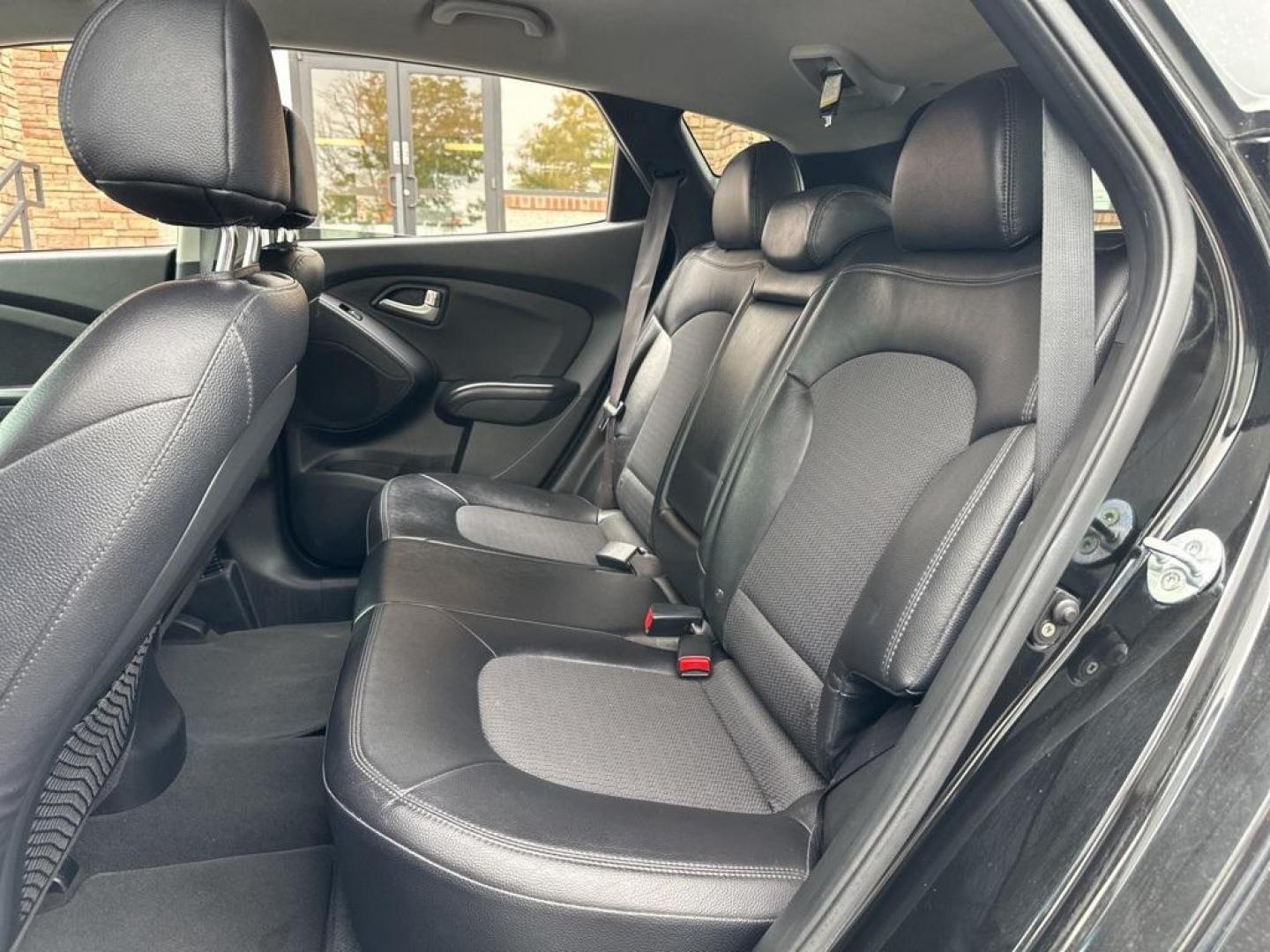 2013 Ash Black /Black Hyundai Tucson GLS (KM8JUCAC6DU) with an 2.4L I4 MPI DOHC CVVT 16V Theta 2 engine, Automatic transmission, located at 10890 W. Colfax Ave., Lakewood, CO, 80215, (303) 274-7692, 39.739914, -105.120132 - 2013 Hyundai Tucson<br><br>D1 Auto NEVER charges dealer fees! All cars have clean titles and have been inspected for mechanical issues. We have financing for everyone. Good credit, bad credit, first time buyers.<br><br>Please call Lakewood Location 303-274-7692 or Thornton 303-287-5511 to schedule a - Photo#12