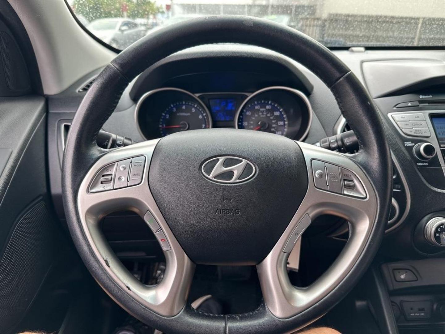 2013 Ash Black /Black Hyundai Tucson GLS (KM8JUCAC6DU) with an 2.4L I4 MPI DOHC CVVT 16V Theta 2 engine, Automatic transmission, located at 10890 W. Colfax Ave., Lakewood, CO, 80215, (303) 274-7692, 39.739914, -105.120132 - 2013 Hyundai Tucson<br><br>D1 Auto NEVER charges dealer fees! All cars have clean titles and have been inspected for mechanical issues. We have financing for everyone. Good credit, bad credit, first time buyers.<br><br>Please call Lakewood Location 303-274-7692 or Thornton 303-287-5511 to schedule a - Photo#20