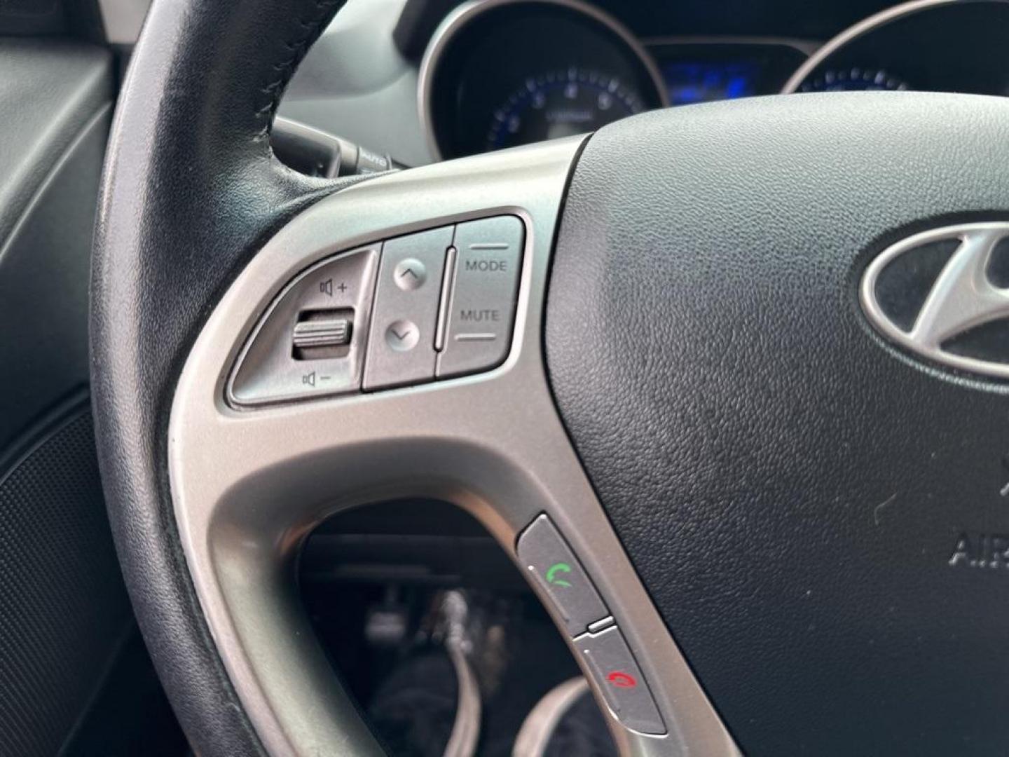 2013 Ash Black /Black Hyundai Tucson GLS (KM8JUCAC6DU) with an 2.4L I4 MPI DOHC CVVT 16V Theta 2 engine, Automatic transmission, located at 10890 W. Colfax Ave., Lakewood, CO, 80215, (303) 274-7692, 39.739914, -105.120132 - 2013 Hyundai Tucson<br><br>D1 Auto NEVER charges dealer fees! All cars have clean titles and have been inspected for mechanical issues. We have financing for everyone. Good credit, bad credit, first time buyers.<br><br>Please call Lakewood Location 303-274-7692 or Thornton 303-287-5511 to schedule a - Photo#21