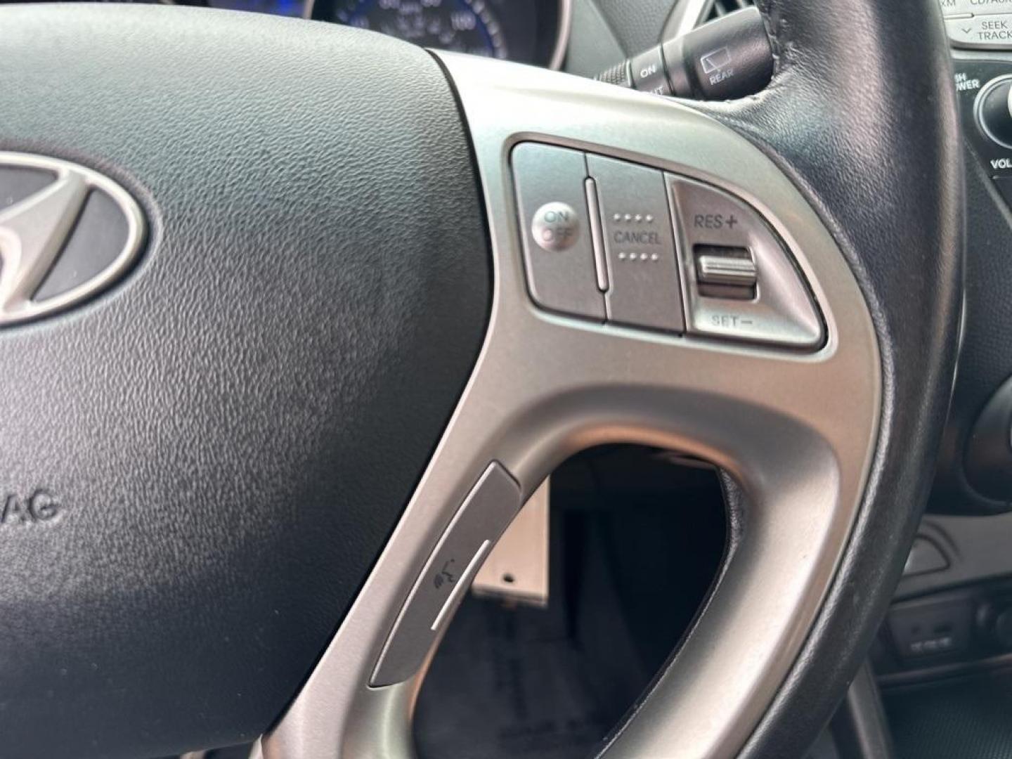 2013 Ash Black /Black Hyundai Tucson GLS (KM8JUCAC6DU) with an 2.4L I4 MPI DOHC CVVT 16V Theta 2 engine, Automatic transmission, located at 10890 W. Colfax Ave., Lakewood, CO, 80215, (303) 274-7692, 39.739914, -105.120132 - 2013 Hyundai Tucson<br><br>D1 Auto NEVER charges dealer fees! All cars have clean titles and have been inspected for mechanical issues. We have financing for everyone. Good credit, bad credit, first time buyers.<br><br>Please call Lakewood Location 303-274-7692 or Thornton 303-287-5511 to schedule a - Photo#22