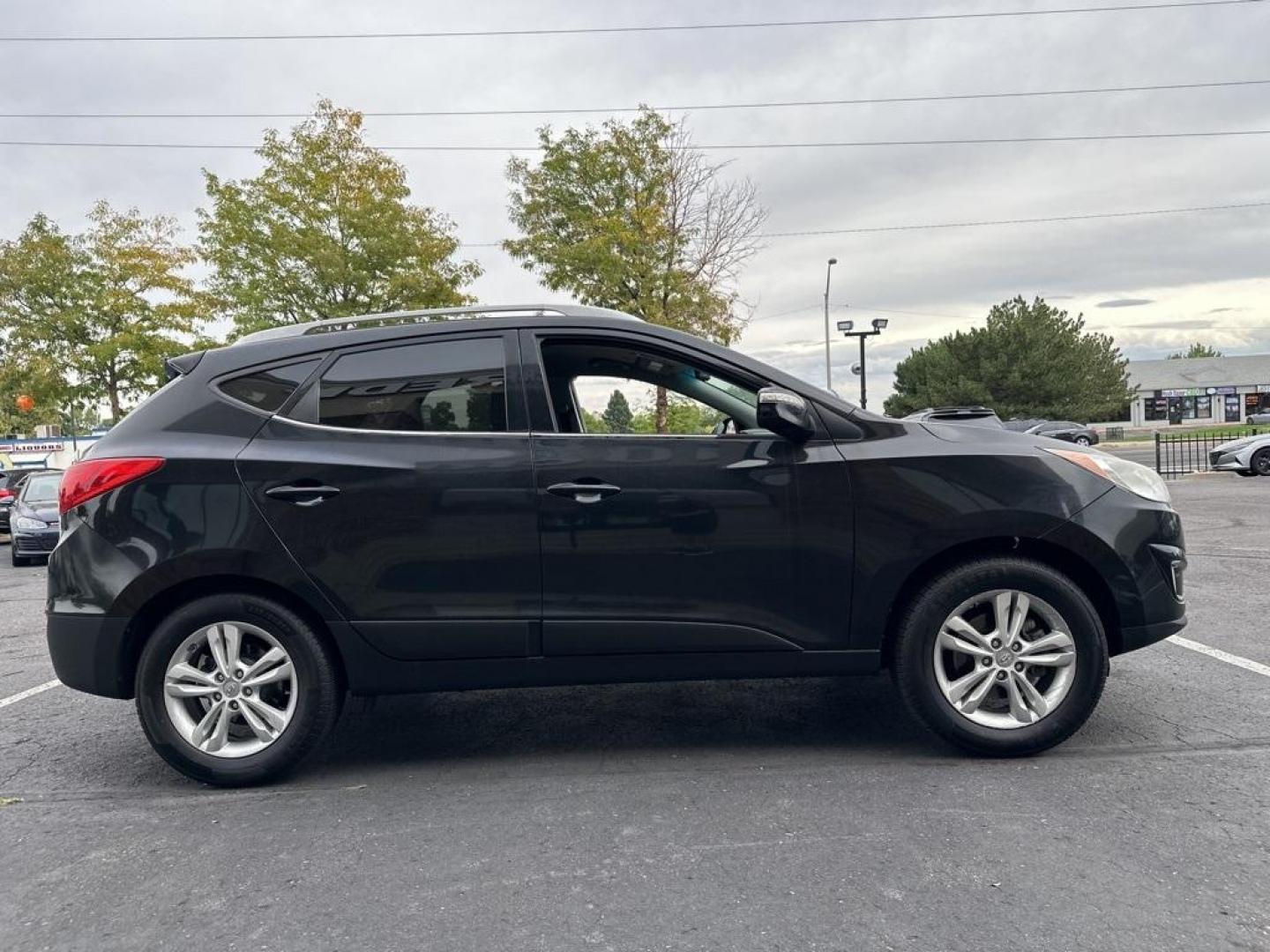 2013 Ash Black /Black Hyundai Tucson GLS (KM8JUCAC6DU) with an 2.4L I4 MPI DOHC CVVT 16V Theta 2 engine, Automatic transmission, located at 10890 W. Colfax Ave., Lakewood, CO, 80215, (303) 274-7692, 39.739914, -105.120132 - 2013 Hyundai Tucson<br><br>D1 Auto NEVER charges dealer fees! All cars have clean titles and have been inspected for mechanical issues. We have financing for everyone. Good credit, bad credit, first time buyers.<br><br>Please call Lakewood Location 303-274-7692 or Thornton 303-287-5511 to schedule a - Photo#4