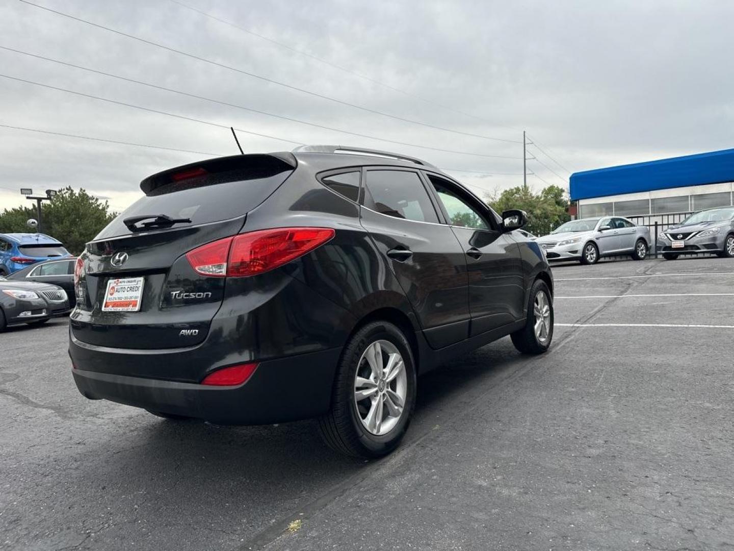 2013 Ash Black /Black Hyundai Tucson GLS (KM8JUCAC6DU) with an 2.4L I4 MPI DOHC CVVT 16V Theta 2 engine, Automatic transmission, located at 10890 W. Colfax Ave., Lakewood, CO, 80215, (303) 274-7692, 39.739914, -105.120132 - 2013 Hyundai Tucson<br><br>D1 Auto NEVER charges dealer fees! All cars have clean titles and have been inspected for mechanical issues. We have financing for everyone. Good credit, bad credit, first time buyers.<br><br>Please call Lakewood Location 303-274-7692 or Thornton 303-287-5511 to schedule a - Photo#5