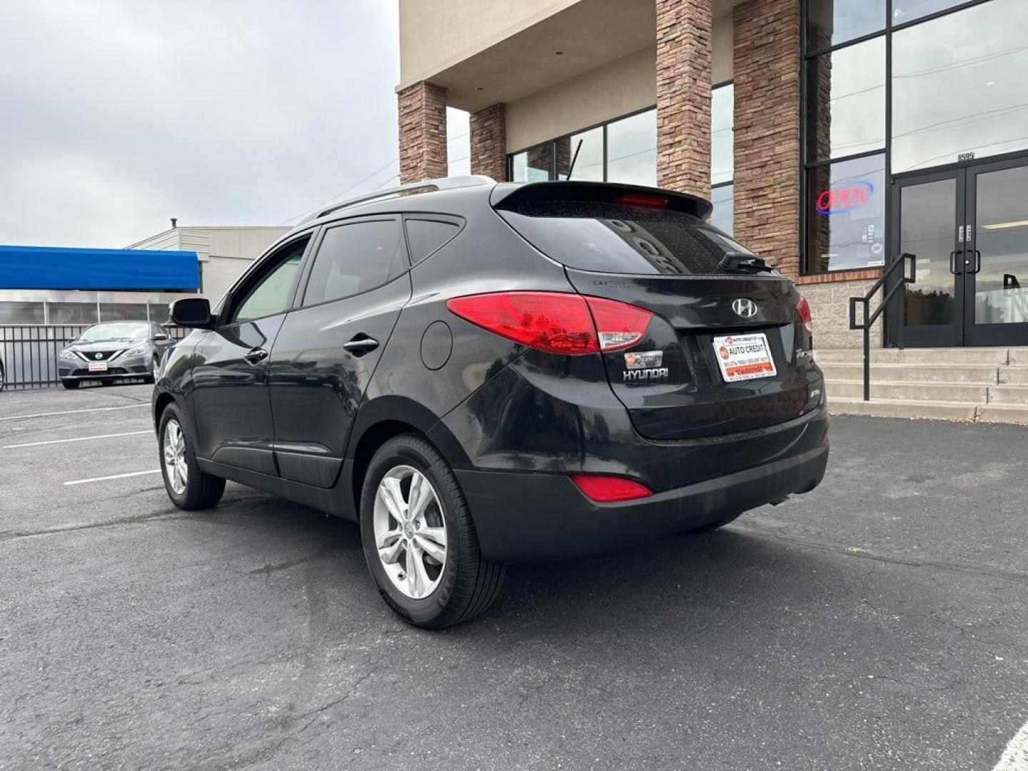 2013 Ash Black /Black Hyundai Tucson GLS (KM8JUCAC6DU) with an 2.4L I4 MPI DOHC CVVT 16V Theta 2 engine, Automatic transmission, located at 10890 W. Colfax Ave., Lakewood, CO, 80215, (303) 274-7692, 39.739914, -105.120132 - 2013 Hyundai Tucson<br><br>D1 Auto NEVER charges dealer fees! All cars have clean titles and have been inspected for mechanical issues. We have financing for everyone. Good credit, bad credit, first time buyers.<br><br>Please call Lakewood Location 303-274-7692 or Thornton 303-287-5511 to schedule a - Photo#7