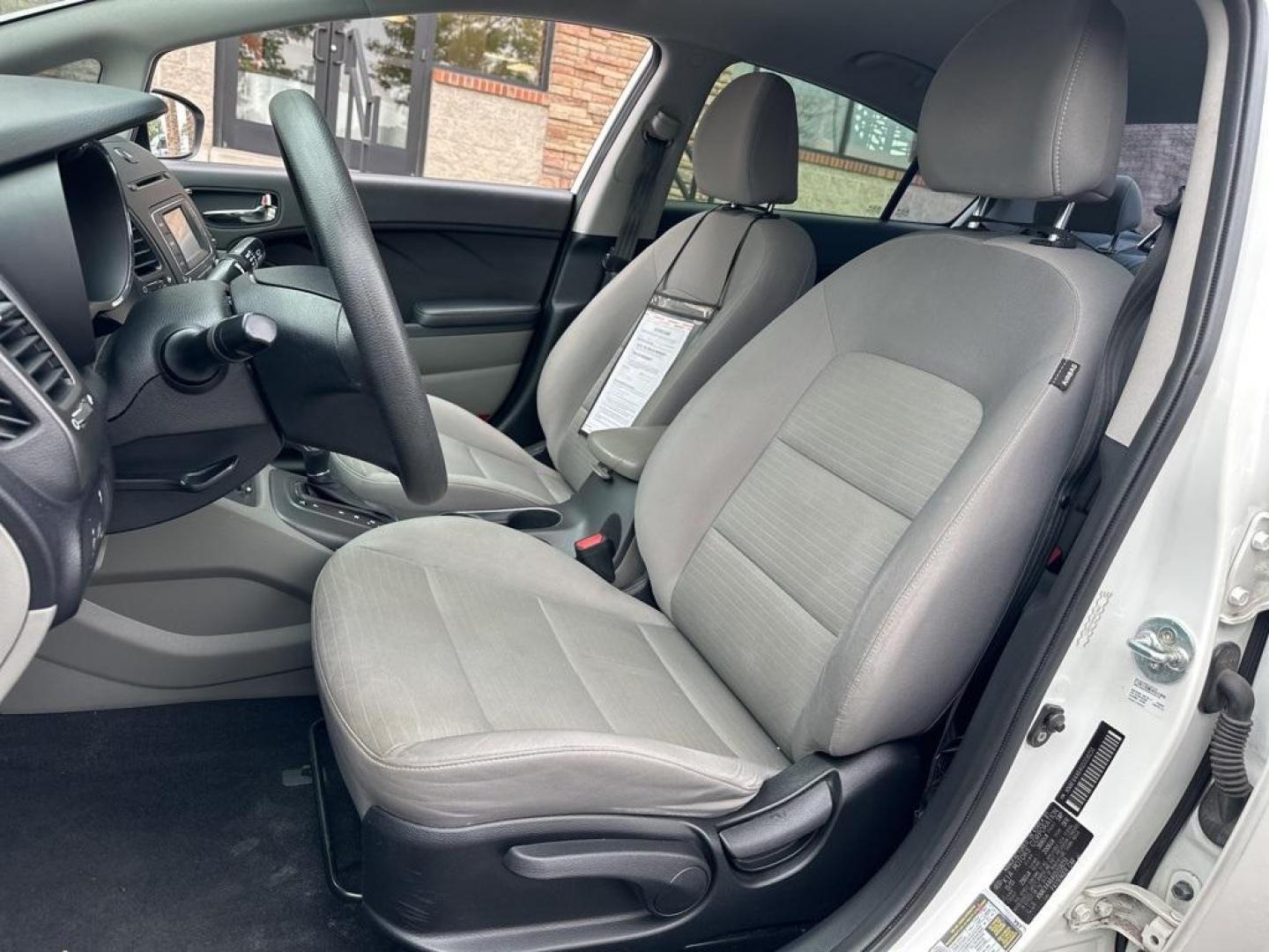 2016 Snow White Pearl /Gray Kia Forte LX (KNAFX4A64G5) with an 1.8L I4 DOHC Dual CVVT engine, Automatic transmission, located at 10890 W. Colfax Ave., Lakewood, CO, 80215, (303) 274-7692, 39.739914, -105.120132 - 2016 Kia Forte<br><br>D1 Auto NEVER charges dealer fees! All cars have clean titles and have been inspected for mechanical issues. We have financing for everyone. Good credit, bad credit, first time buyers.<br><br>Please call Lakewood Location 303-274-7692 or Thornton 303-287-5511 to schedule a test - Photo#14