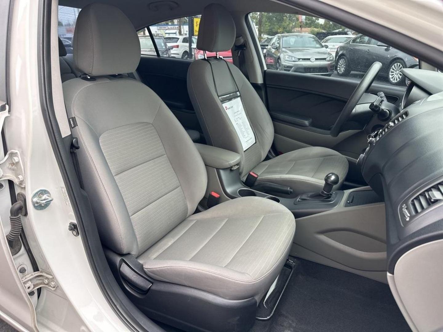 2016 Snow White Pearl /Gray Kia Forte LX (KNAFX4A64G5) with an 1.8L I4 DOHC Dual CVVT engine, Automatic transmission, located at 10890 W. Colfax Ave., Lakewood, CO, 80215, (303) 274-7692, 39.739914, -105.120132 - 2016 Kia Forte<br><br>D1 Auto NEVER charges dealer fees! All cars have clean titles and have been inspected for mechanical issues. We have financing for everyone. Good credit, bad credit, first time buyers.<br><br>Please call Lakewood Location 303-274-7692 or Thornton 303-287-5511 to schedule a test - Photo#15