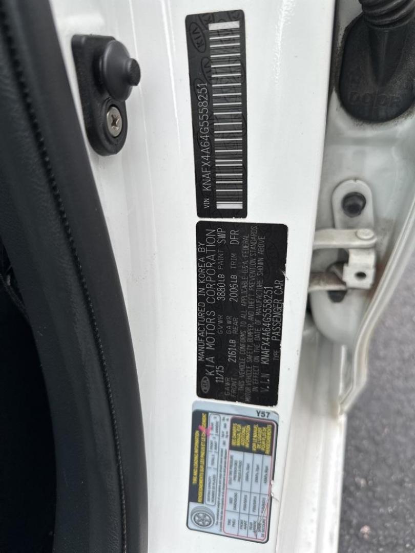2016 Snow White Pearl /Gray Kia Forte LX (KNAFX4A64G5) with an 1.8L I4 DOHC Dual CVVT engine, Automatic transmission, located at 10890 W. Colfax Ave., Lakewood, CO, 80215, (303) 274-7692, 39.739914, -105.120132 - 2016 Kia Forte<br><br>D1 Auto NEVER charges dealer fees! All cars have clean titles and have been inspected for mechanical issues. We have financing for everyone. Good credit, bad credit, first time buyers.<br><br>Please call Lakewood Location 303-274-7692 or Thornton 303-287-5511 to schedule a test - Photo#18