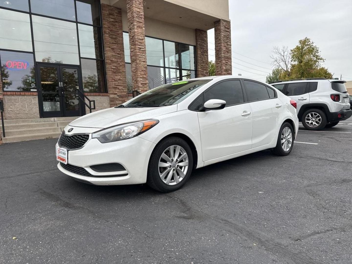 2016 Snow White Pearl /Gray Kia Forte LX (KNAFX4A64G5) with an 1.8L I4 DOHC Dual CVVT engine, Automatic transmission, located at 10890 W. Colfax Ave., Lakewood, CO, 80215, (303) 274-7692, 39.739914, -105.120132 - 2016 Kia Forte<br><br>D1 Auto NEVER charges dealer fees! All cars have clean titles and have been inspected for mechanical issues. We have financing for everyone. Good credit, bad credit, first time buyers.<br><br>Please call Lakewood Location 303-274-7692 or Thornton 303-287-5511 to schedule a test - Photo#1