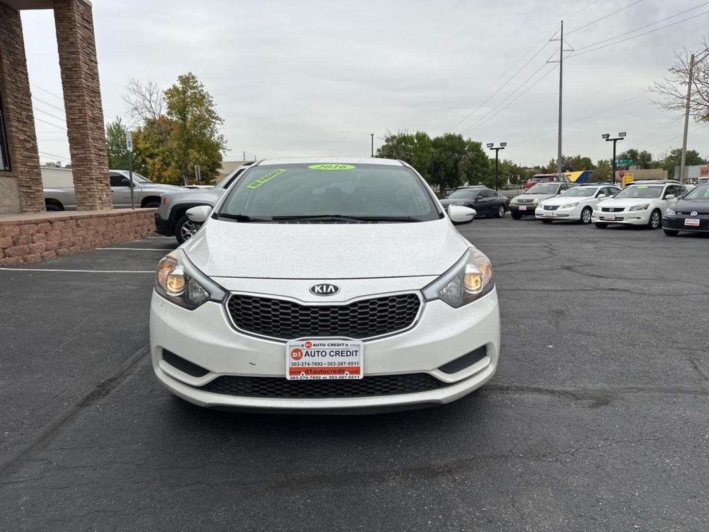 2016 Snow White Pearl /Gray Kia Forte LX (KNAFX4A64G5) with an 1.8L I4 DOHC Dual CVVT engine, Automatic transmission, located at 10890 W. Colfax Ave., Lakewood, CO, 80215, (303) 274-7692, 39.739914, -105.120132 - 2016 Kia Forte<br><br>D1 Auto NEVER charges dealer fees! All cars have clean titles and have been inspected for mechanical issues. We have financing for everyone. Good credit, bad credit, first time buyers.<br><br>Please call Lakewood Location 303-274-7692 or Thornton 303-287-5511 to schedule a test - Photo#2