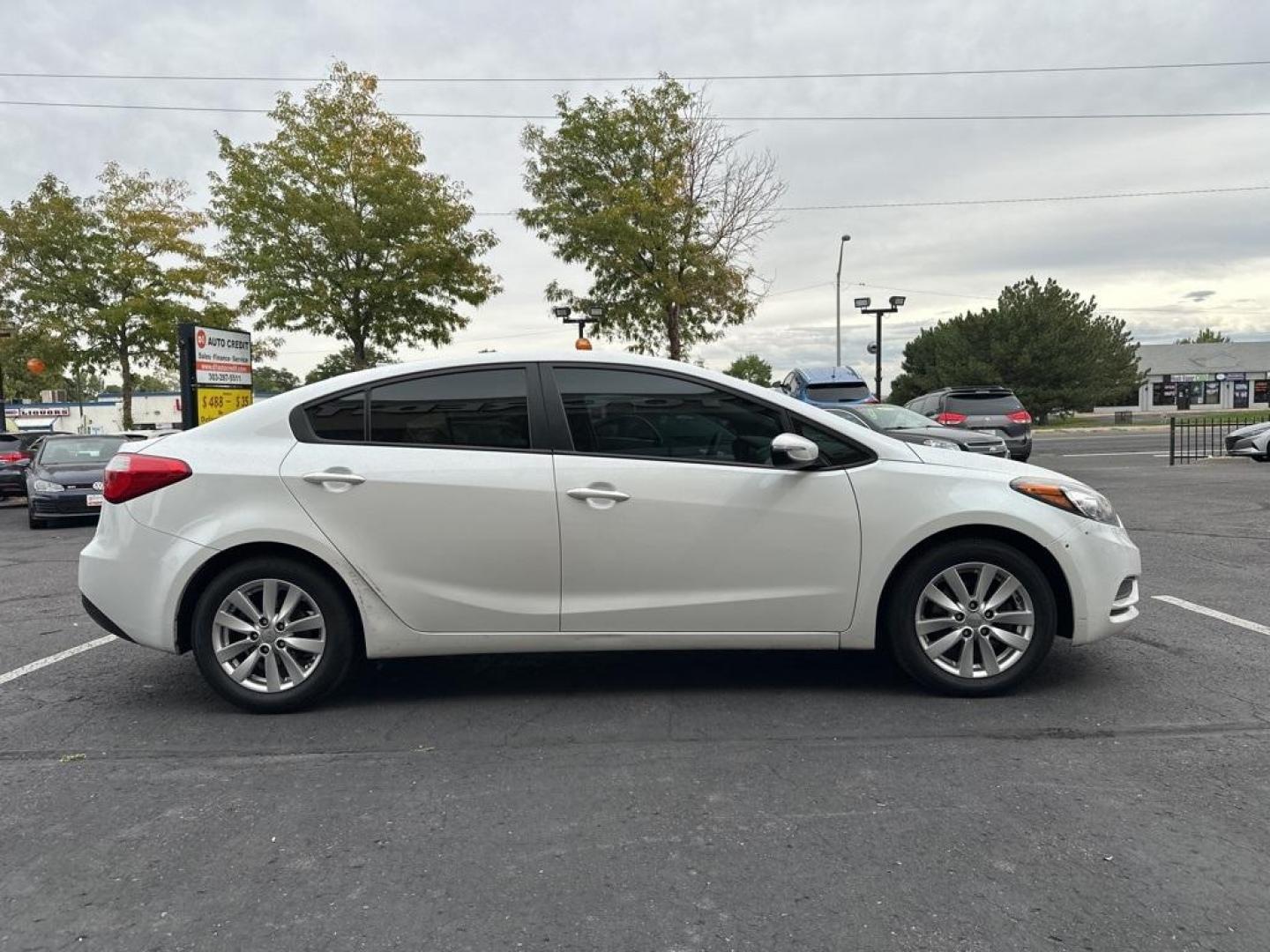 2016 Snow White Pearl /Gray Kia Forte LX (KNAFX4A64G5) with an 1.8L I4 DOHC Dual CVVT engine, Automatic transmission, located at 10890 W. Colfax Ave., Lakewood, CO, 80215, (303) 274-7692, 39.739914, -105.120132 - 2016 Kia Forte<br><br>D1 Auto NEVER charges dealer fees! All cars have clean titles and have been inspected for mechanical issues. We have financing for everyone. Good credit, bad credit, first time buyers.<br><br>Please call Lakewood Location 303-274-7692 or Thornton 303-287-5511 to schedule a test - Photo#4
