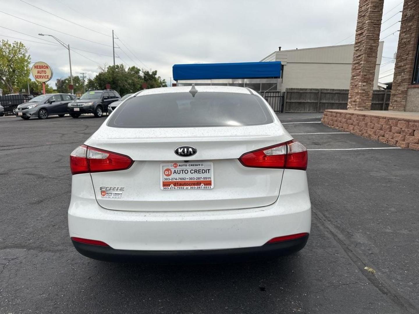 2016 Snow White Pearl /Gray Kia Forte LX (KNAFX4A64G5) with an 1.8L I4 DOHC Dual CVVT engine, Automatic transmission, located at 10890 W. Colfax Ave., Lakewood, CO, 80215, (303) 274-7692, 39.739914, -105.120132 - 2016 Kia Forte<br><br>D1 Auto NEVER charges dealer fees! All cars have clean titles and have been inspected for mechanical issues. We have financing for everyone. Good credit, bad credit, first time buyers.<br><br>Please call Lakewood Location 303-274-7692 or Thornton 303-287-5511 to schedule a test - Photo#6
