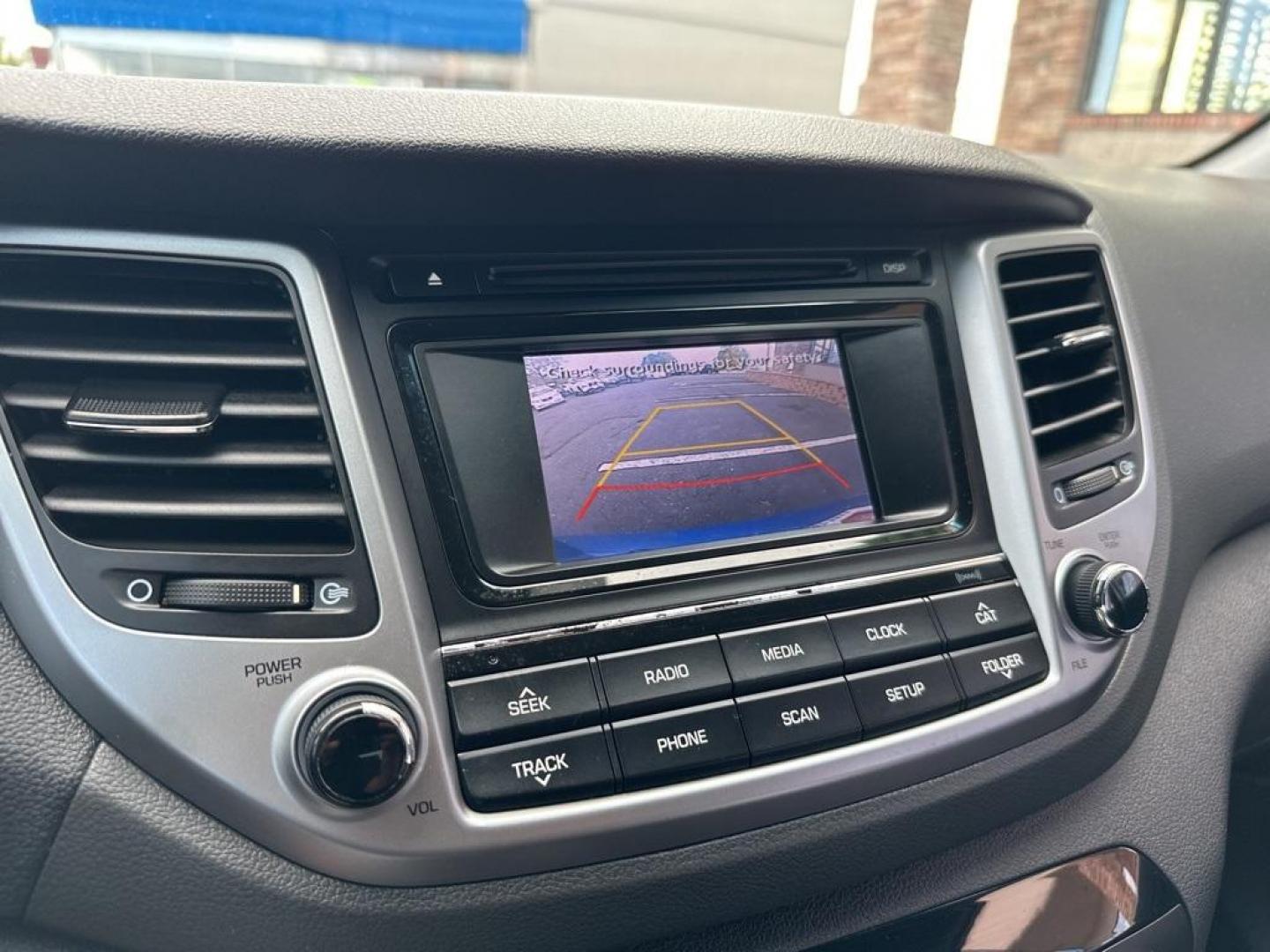2017 Caribbean Blue /Black Hyundai Tucson SE (KM8J3CA40HU) with an 2.0L DOHC engine, Automatic transmission, located at 10890 W. Colfax Ave., Lakewood, CO, 80215, (303) 274-7692, 39.739914, -105.120132 - 2017 Hyundai Tucson All Wheel Drive with clean Colorado title and fully serviced in excellent condition inside and out. Backup Camera, Bluetooth and more.<br><br>All Cars Have Clean Titles And Are Serviced Before Sale., Backup Camera, AWD.<br>D1 Auto NEVER charges dealer fees! All cars have clean ti - Photo#10