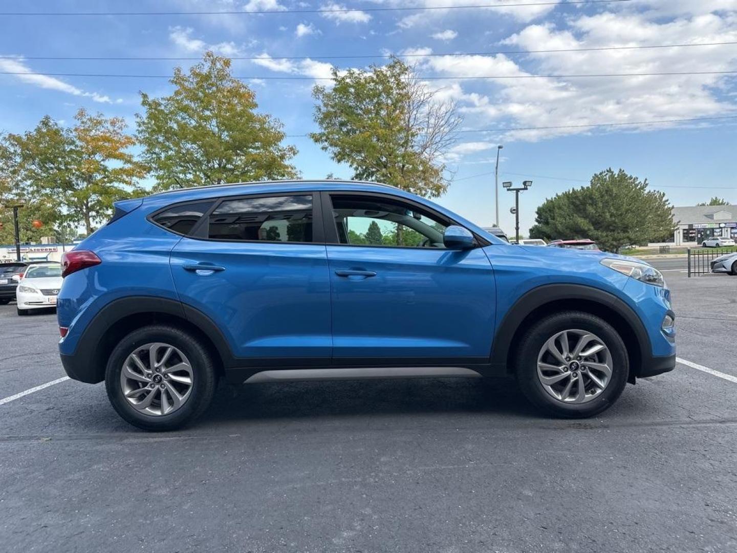 2017 Caribbean Blue /Black Hyundai Tucson SE (KM8J3CA40HU) with an 2.0L DOHC engine, Automatic transmission, located at 10890 W. Colfax Ave., Lakewood, CO, 80215, (303) 274-7692, 39.739914, -105.120132 - 2017 Hyundai Tucson All Wheel Drive with clean Colorado title and fully serviced in excellent condition inside and out. Backup Camera, Bluetooth and more.<br><br>All Cars Have Clean Titles And Are Serviced Before Sale., Backup Camera, AWD.<br>D1 Auto NEVER charges dealer fees! All cars have clean ti - Photo#4