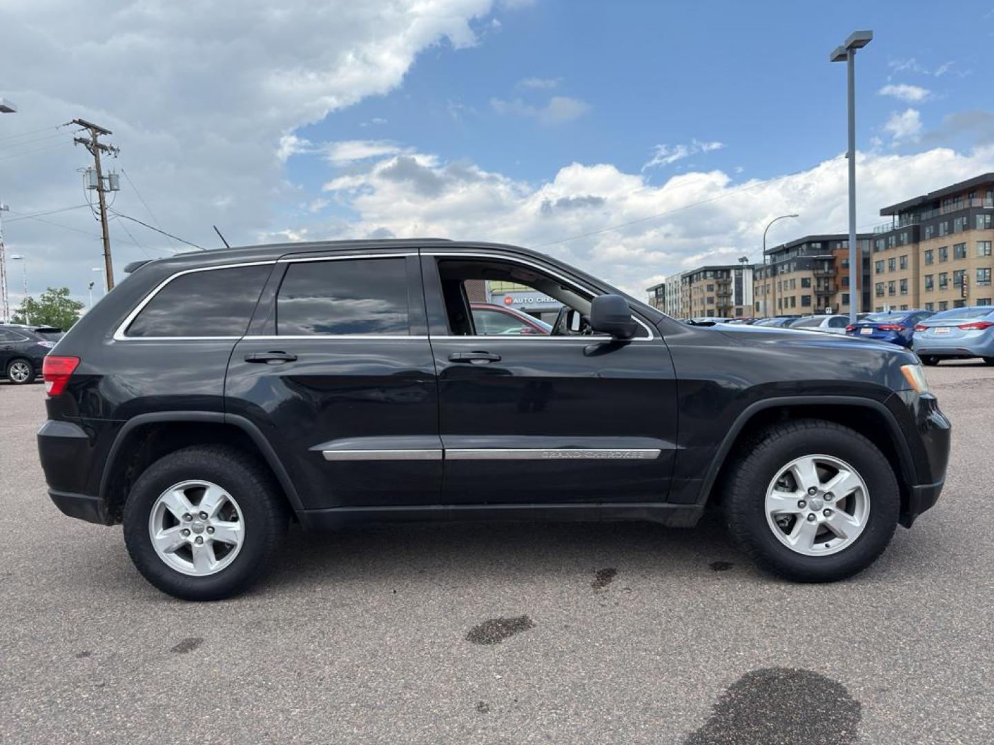 2013 BLACK Jeep Grand Cherokee Laredo (1C4RJFAG1DC) with an V6, 3.6L engine, Automatic transmission, located at 10890 W. Colfax Ave., Lakewood, CO, 80215, (303) 274-7692, 39.739914, -105.120132 - Photo#3