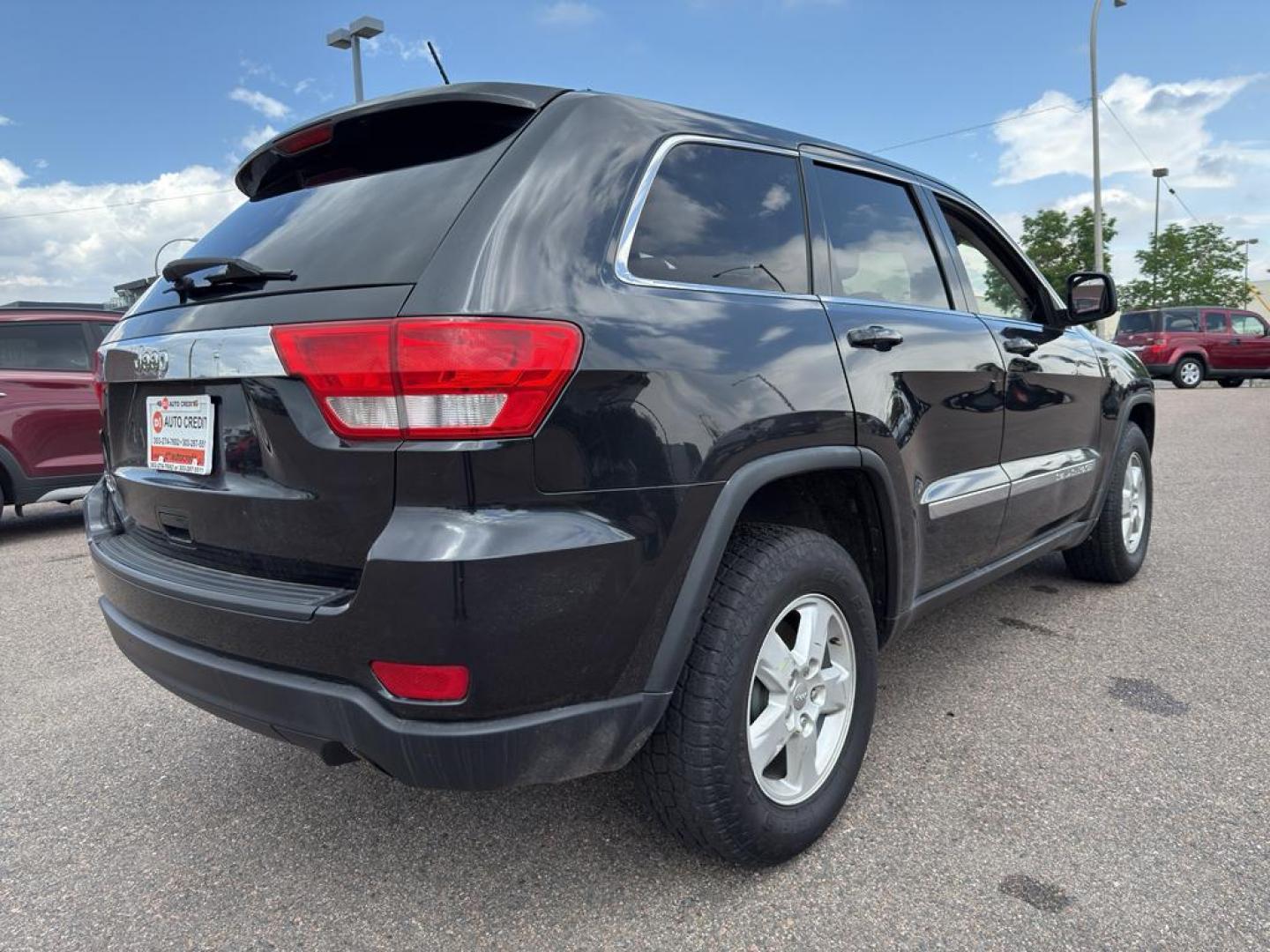 2013 BLACK Jeep Grand Cherokee Laredo (1C4RJFAG1DC) with an V6, 3.6L engine, Automatic transmission, located at 10890 W. Colfax Ave., Lakewood, CO, 80215, (303) 274-7692, 39.739914, -105.120132 - Photo#4