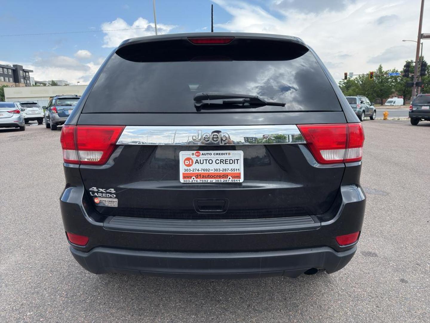 2013 BLACK Jeep Grand Cherokee Laredo (1C4RJFAG1DC) with an V6, 3.6L engine, Automatic transmission, located at 10890 W. Colfax Ave., Lakewood, CO, 80215, (303) 274-7692, 39.739914, -105.120132 - Photo#5