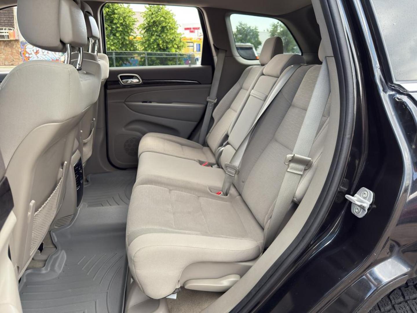 2013 BLACK Jeep Grand Cherokee Laredo (1C4RJFAG1DC) with an V6, 3.6L engine, Automatic transmission, located at 10890 W. Colfax Ave., Lakewood, CO, 80215, (303) 274-7692, 39.739914, -105.120132 - Photo#14