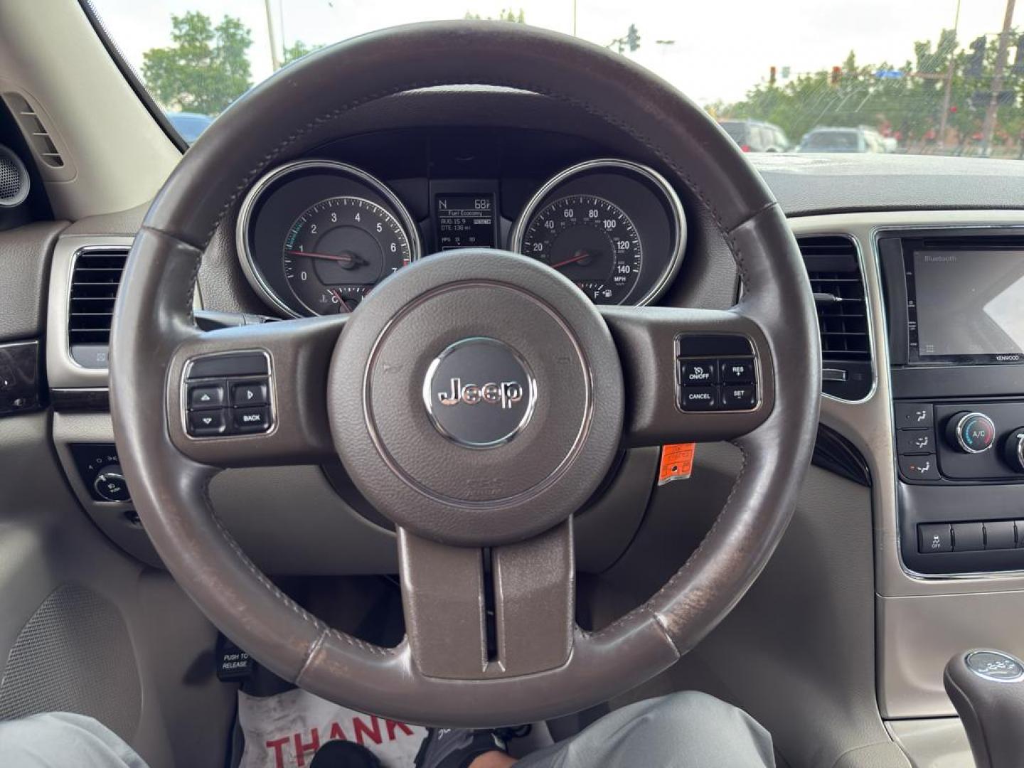 2013 BLACK Jeep Grand Cherokee Laredo (1C4RJFAG1DC) with an V6, 3.6L engine, Automatic transmission, located at 10890 W. Colfax Ave., Lakewood, CO, 80215, (303) 274-7692, 39.739914, -105.120132 - Photo#21