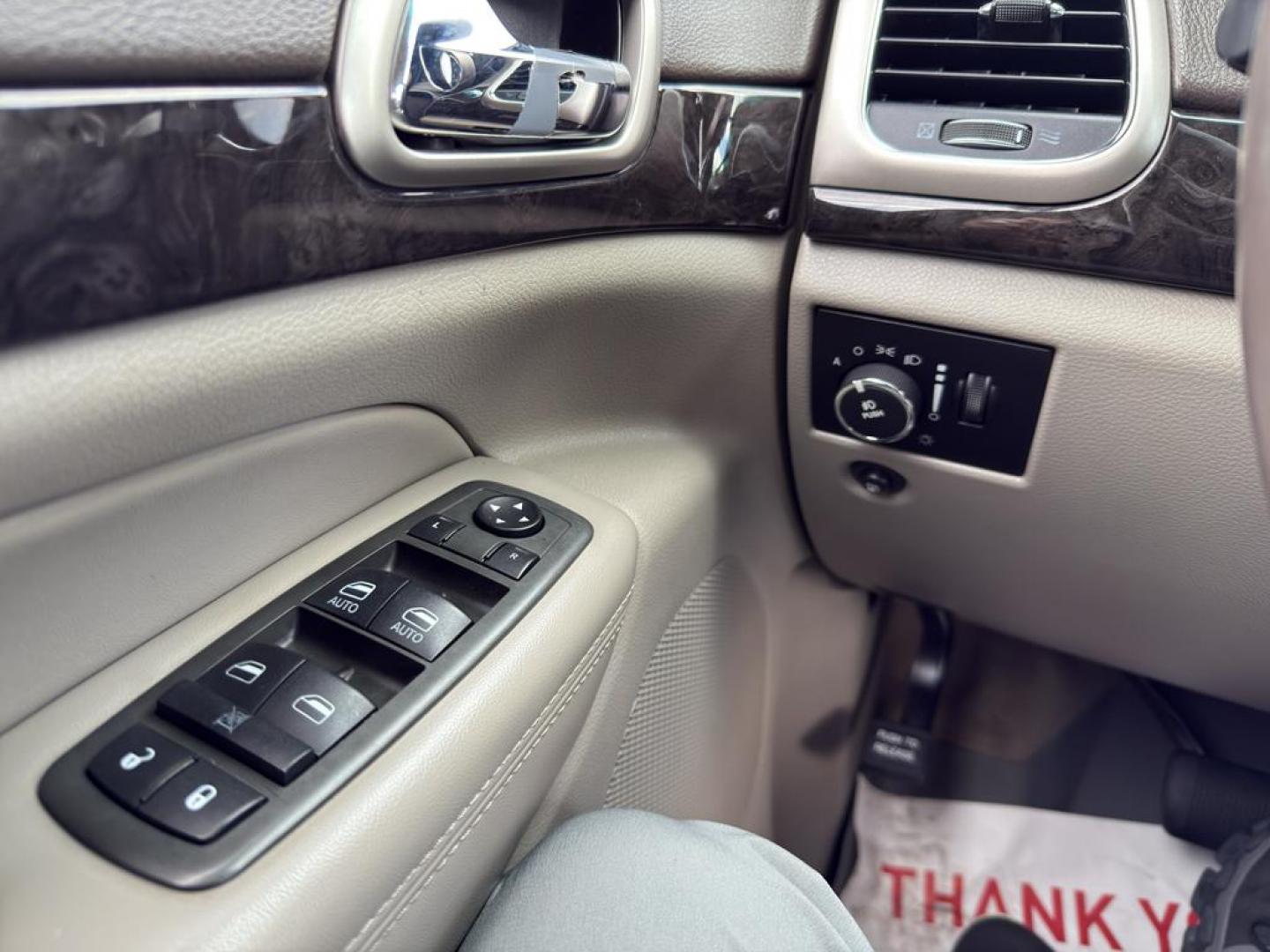 2013 BLACK Jeep Grand Cherokee Laredo (1C4RJFAG1DC) with an V6, 3.6L engine, Automatic transmission, located at 10890 W. Colfax Ave., Lakewood, CO, 80215, (303) 274-7692, 39.739914, -105.120132 - Photo#22